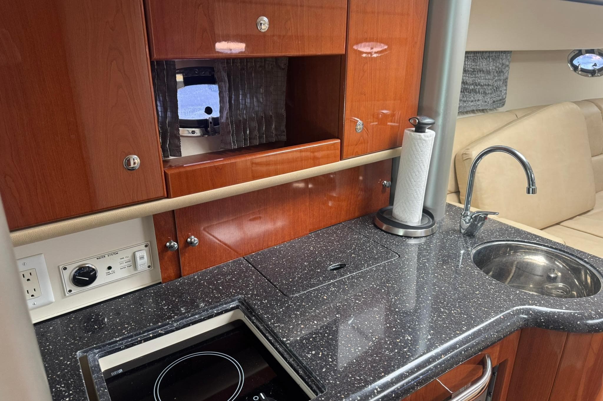 Interior of 2008 Formula 400 Super Sport yacht with kitchenette and seating area.