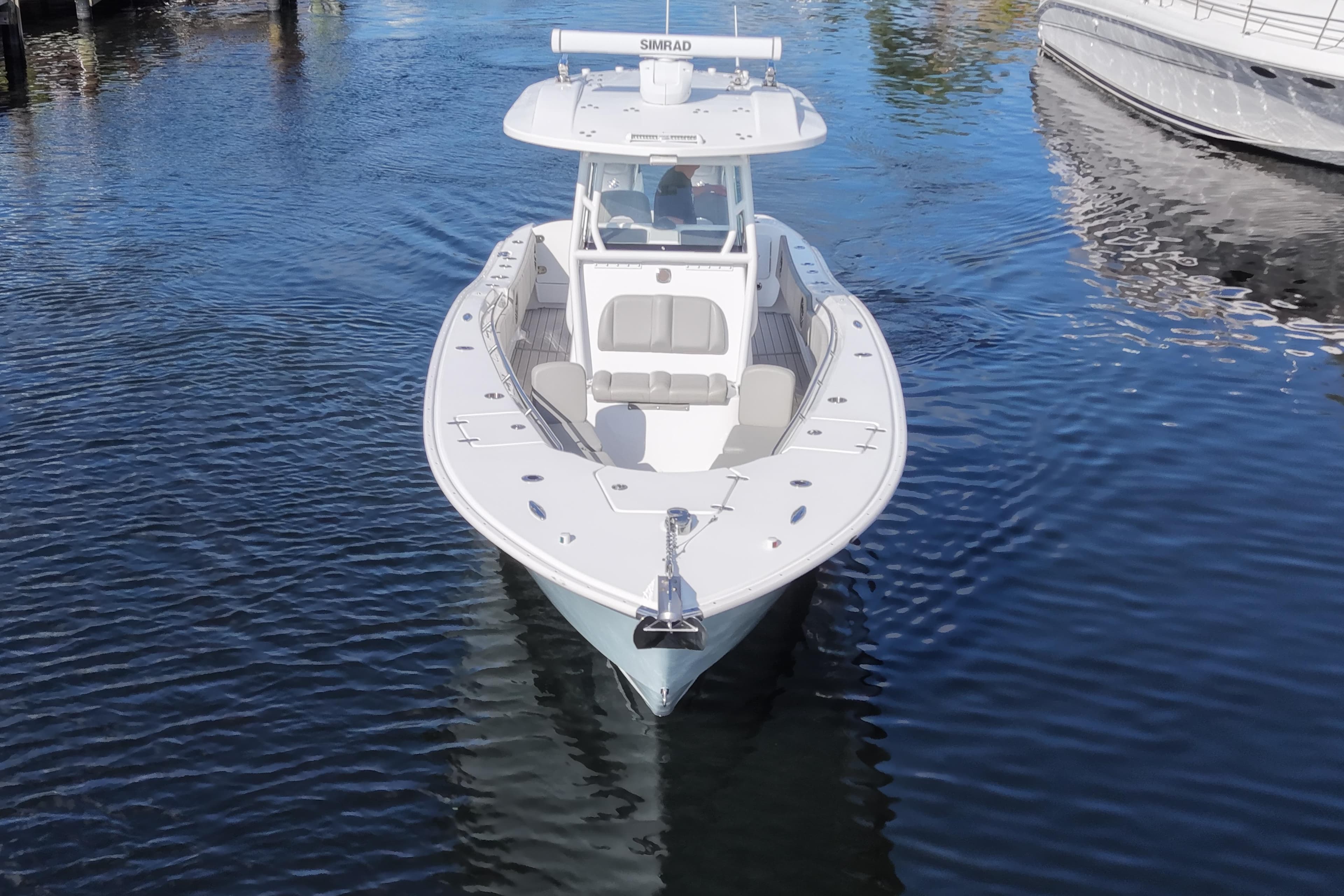 2023 Cape Horn 32 XS boat on calm water, front view.
