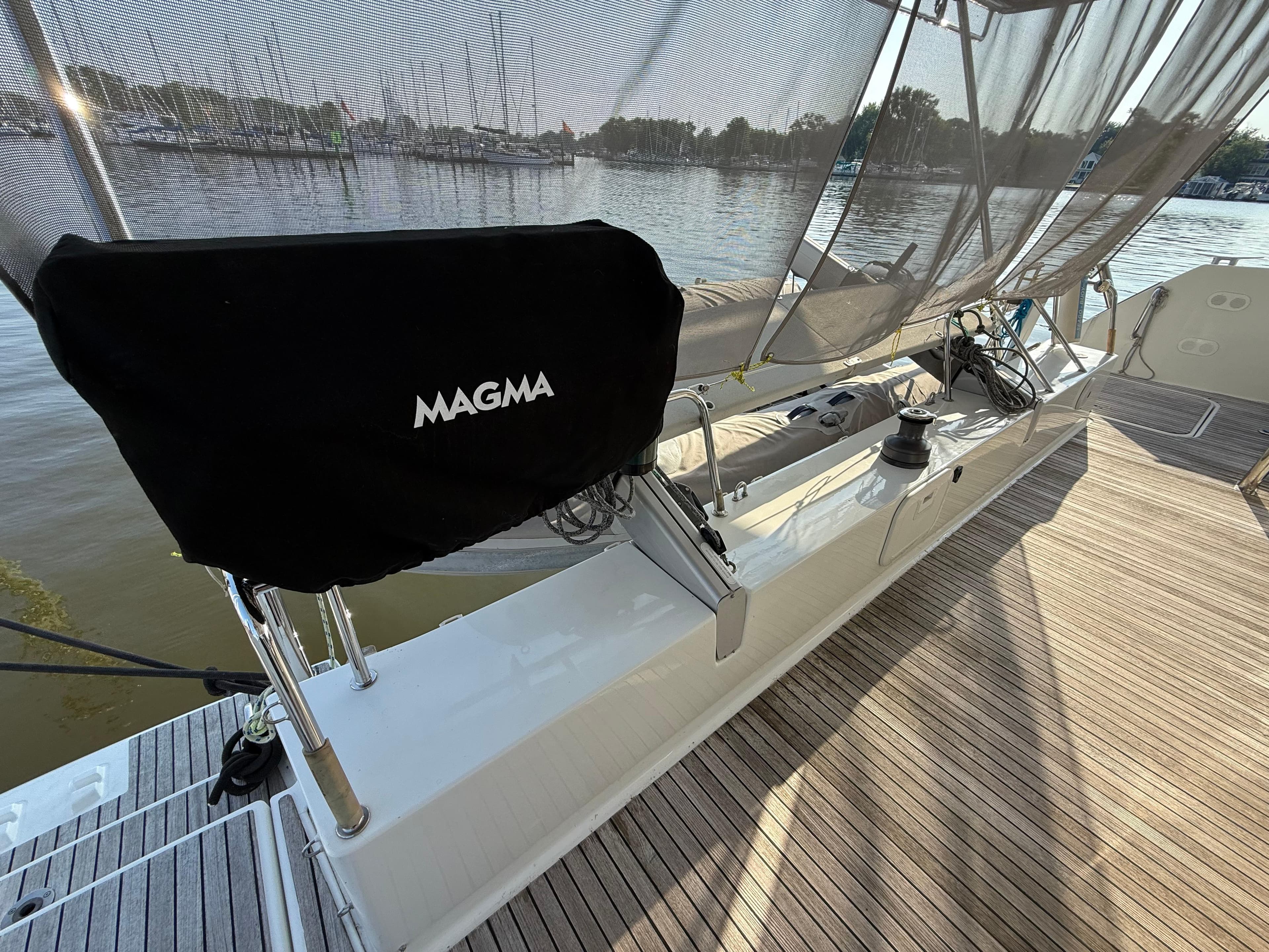 Deck of 2015 Fountaine Pajot Helia 44 catamaran with Magma grill cover.