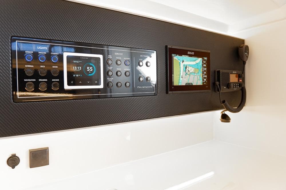 Italia Yachts 11.98 (2026) control panel with navigation and communication systems.