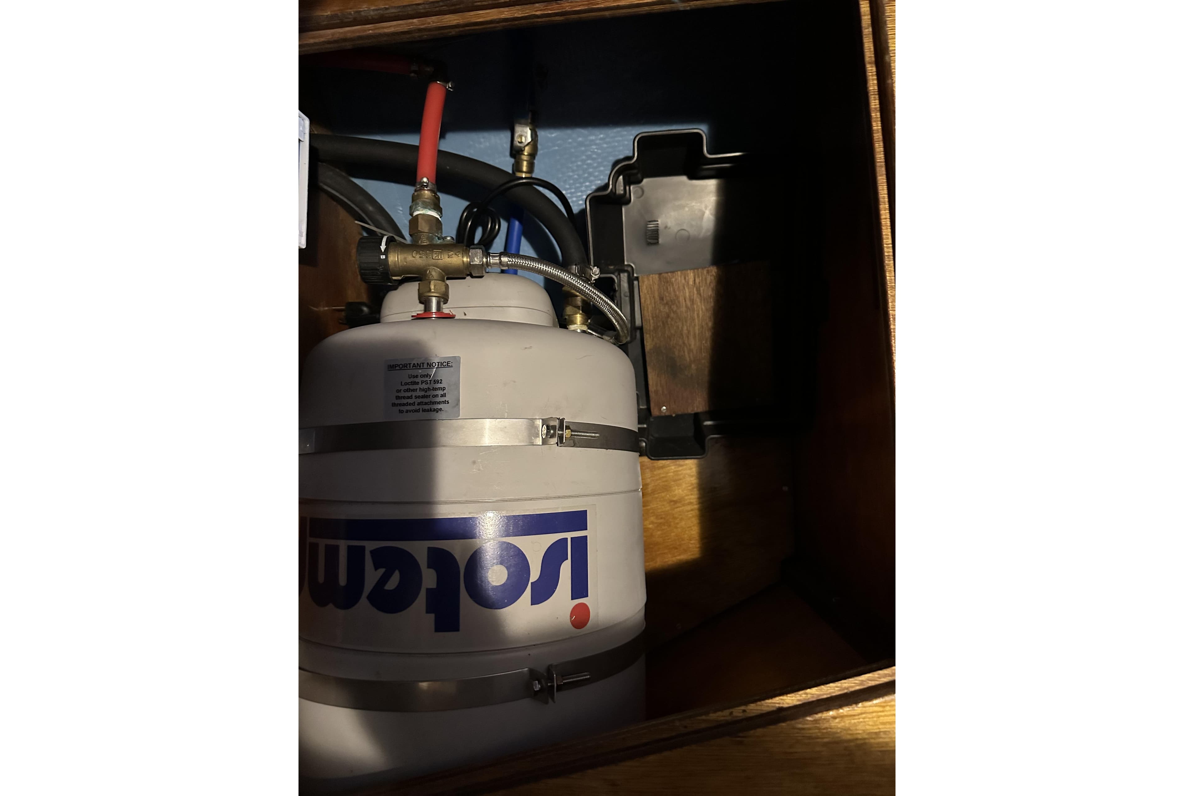Propane tank installation in 1984 Sabre 34-1 sailboat interior compartment.