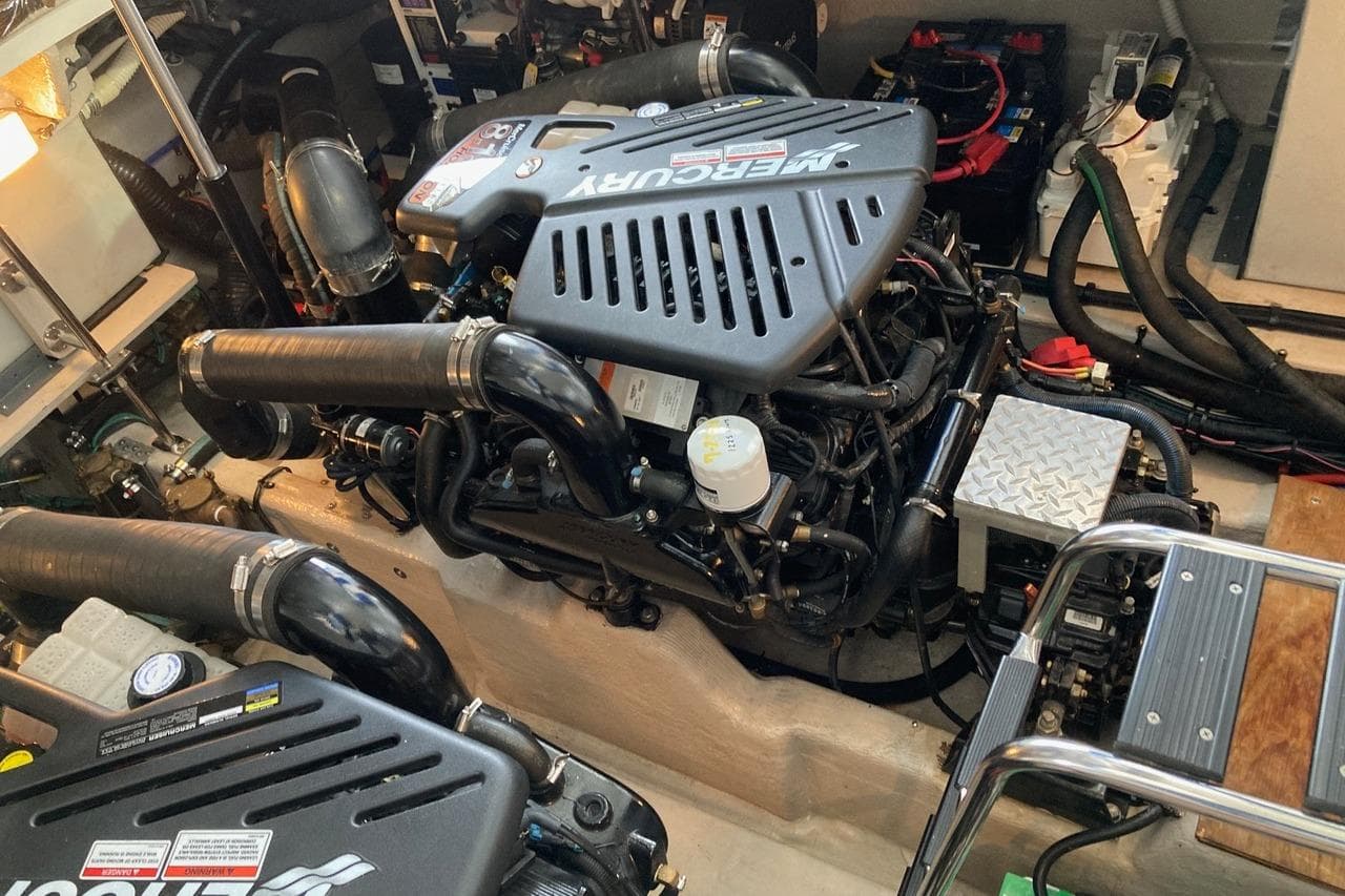 Engine room of a 2008 Sea Ray 44 Sundancer with Mercury engines and various components.
