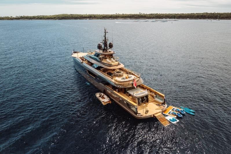 Luxurious 2025 Admiral S-Force 55 yacht cruising in serene blue waters.