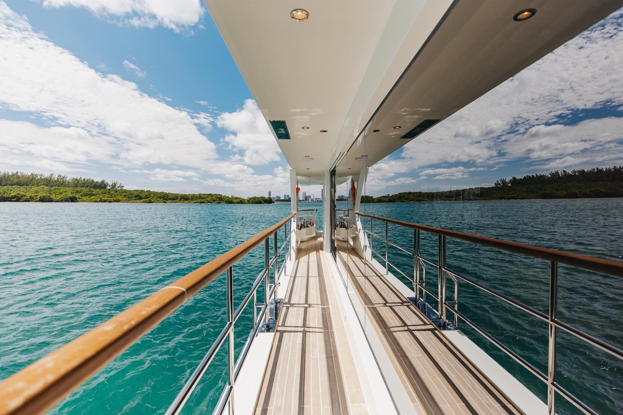 Luxurious 2018 Benetti Fast 125 yacht deck with scenic ocean view.