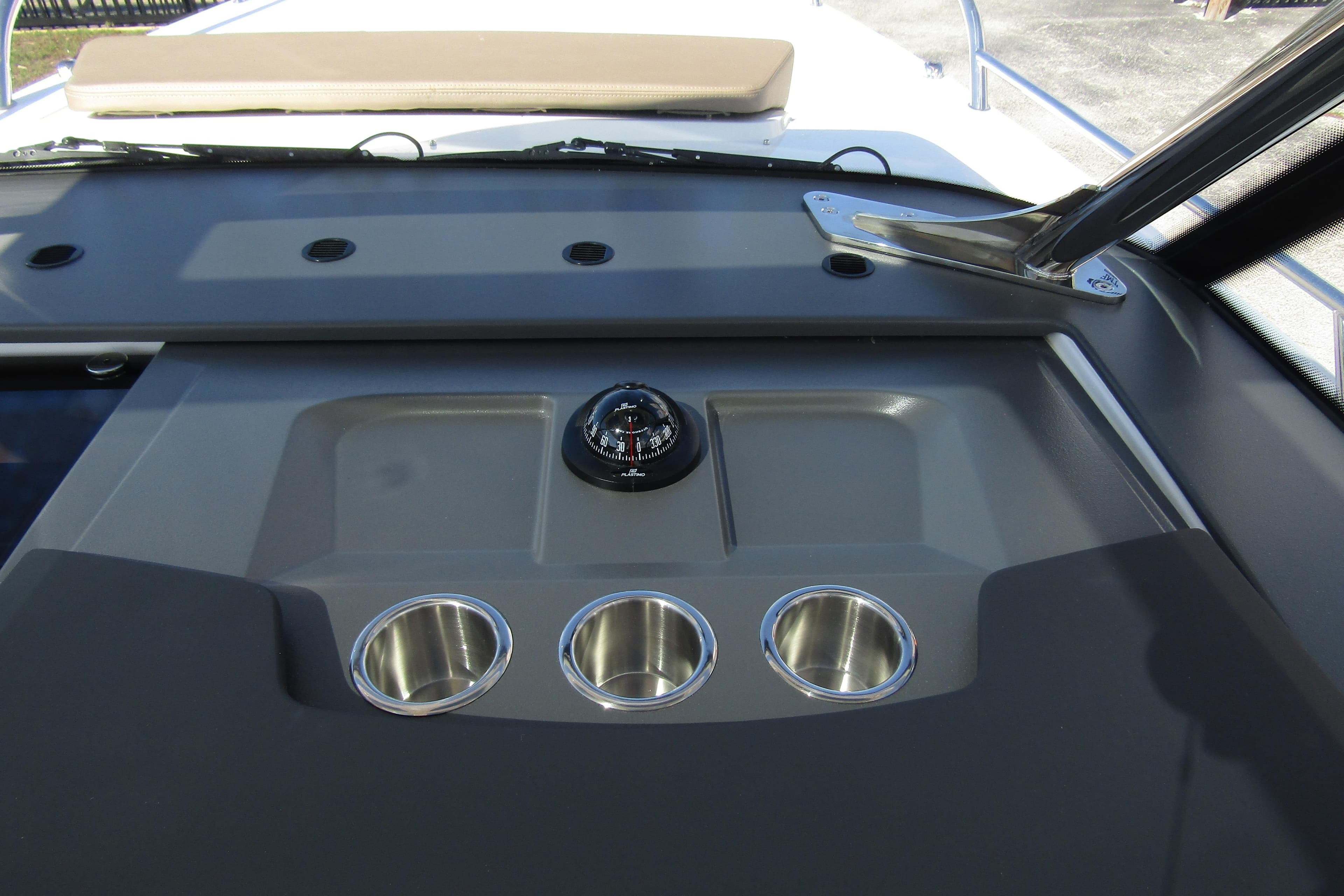 Interior view of 2026 Nimbus Tender 9 with compass and cup holders.