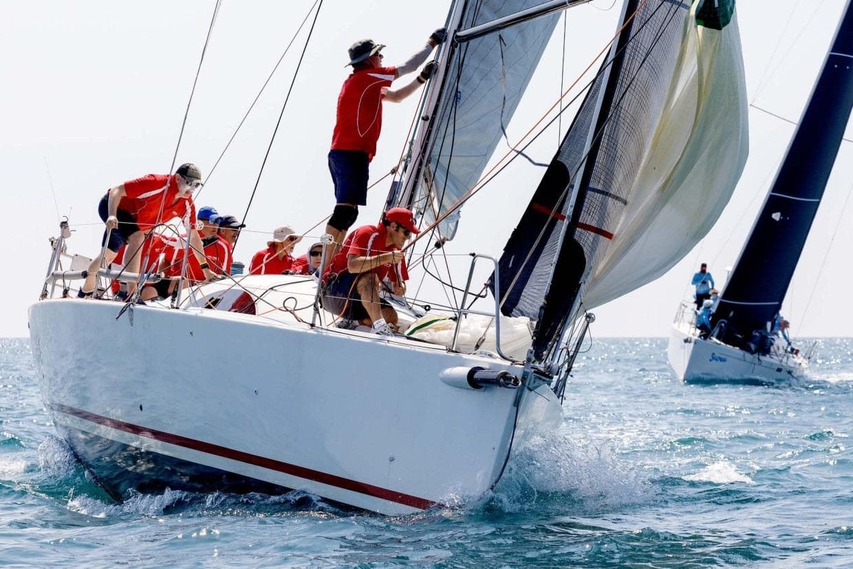 Sailing race with Archambault A40 RC, 2010 model, crew in action on the water.