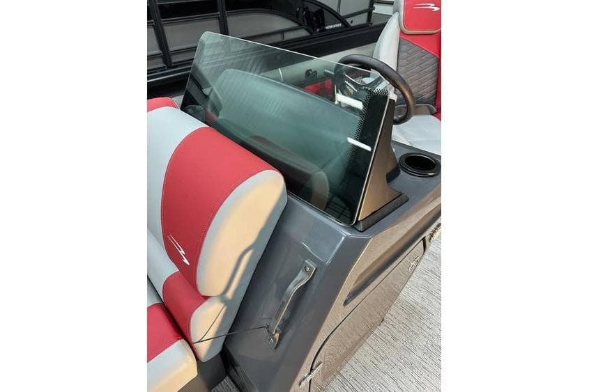 2026 Bennington 22 SSR Quad Bench boat interior with red and gray seating.