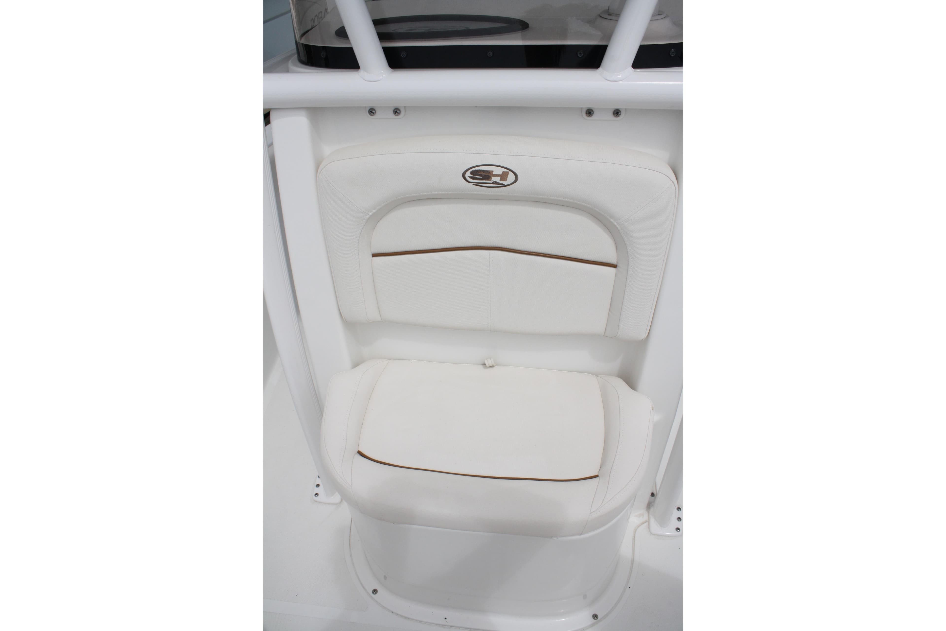 2022 Sea Hunt Ultra 219 boat seat with white cushioned design and logo detail.