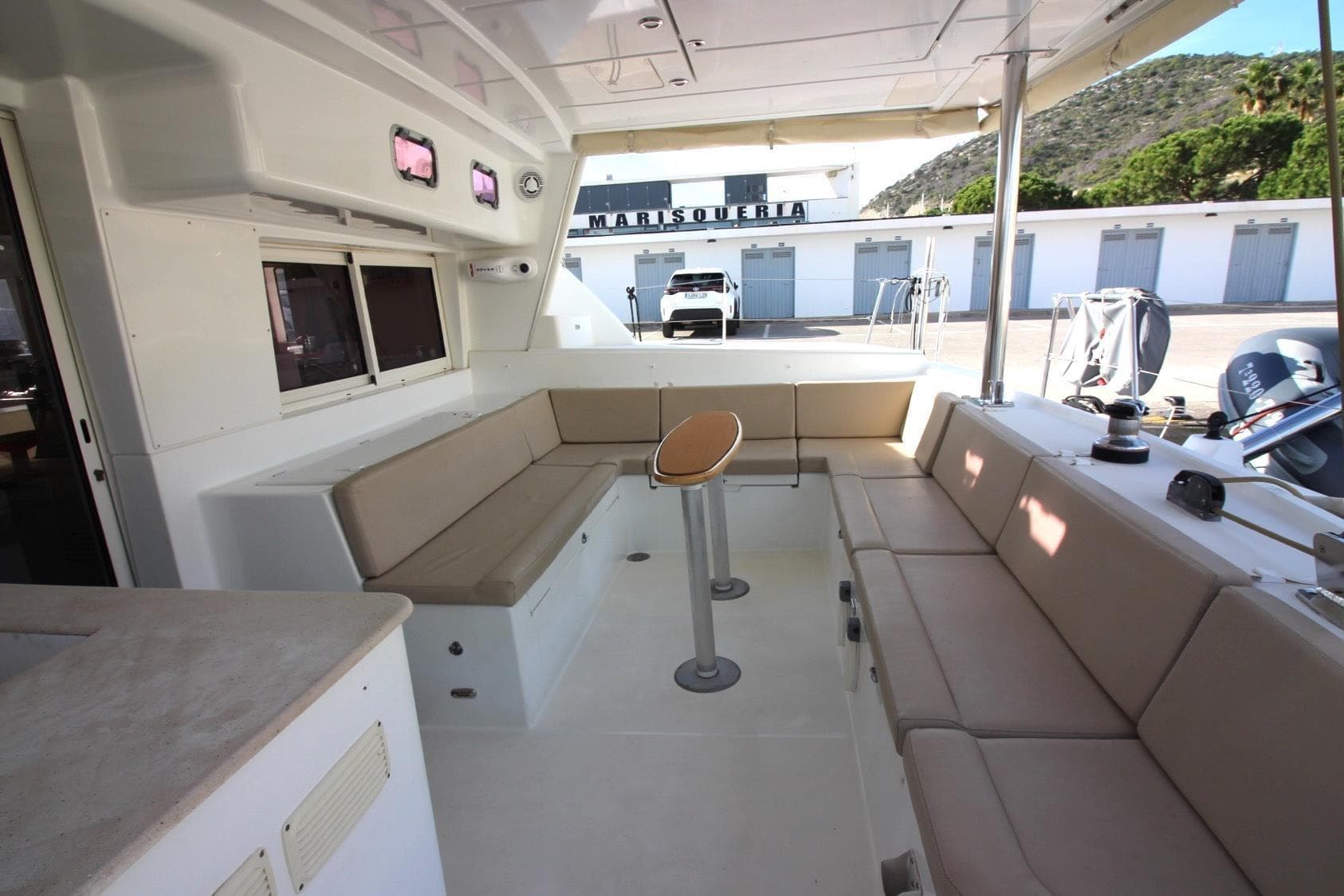 Spacious 2009 Lagoon 440 yacht interior with comfortable seating and modern design.
