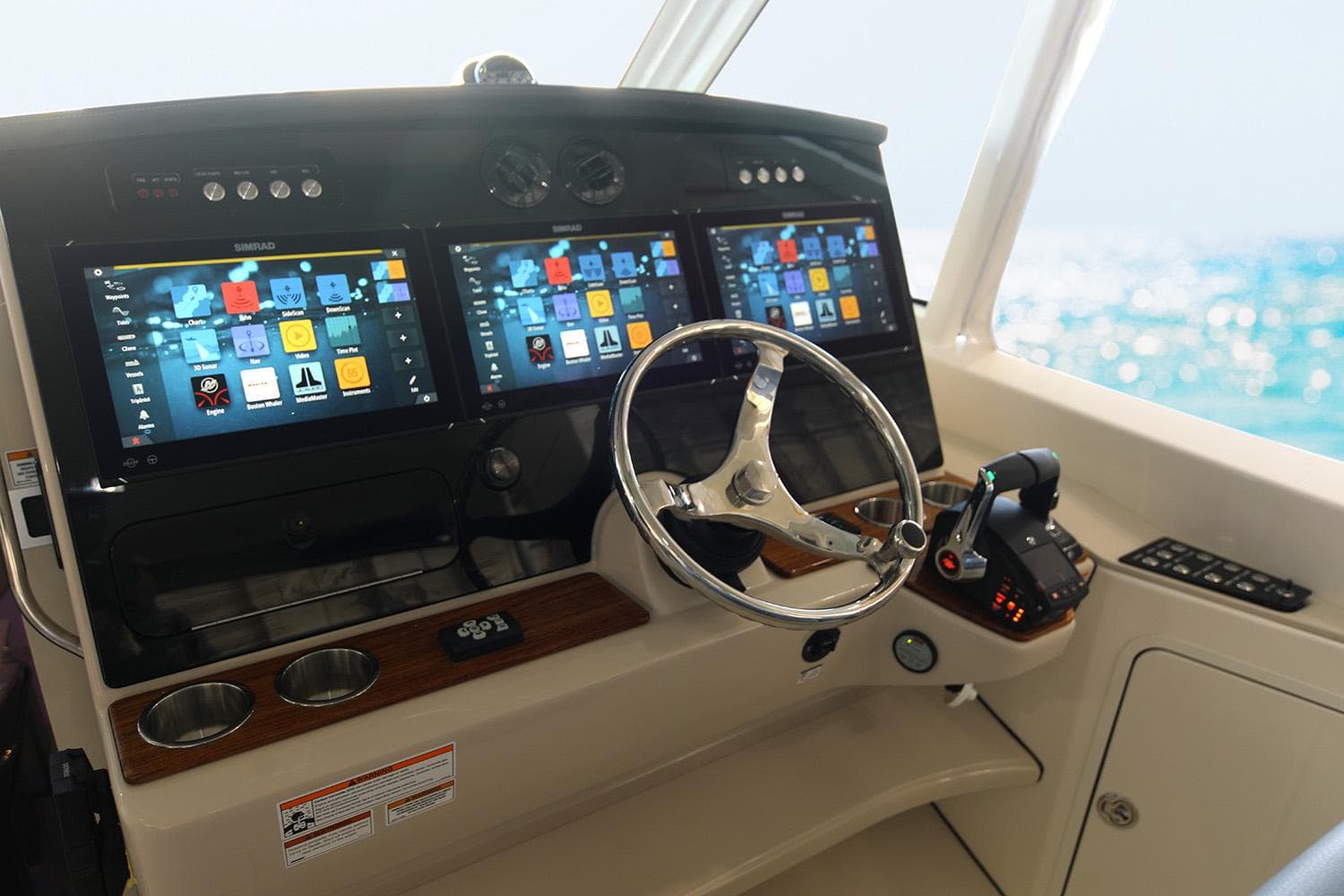 Manufacturer Provided Image: 2026 Boston Whaler 380 Realm helm with advanced navigation displays and controls.