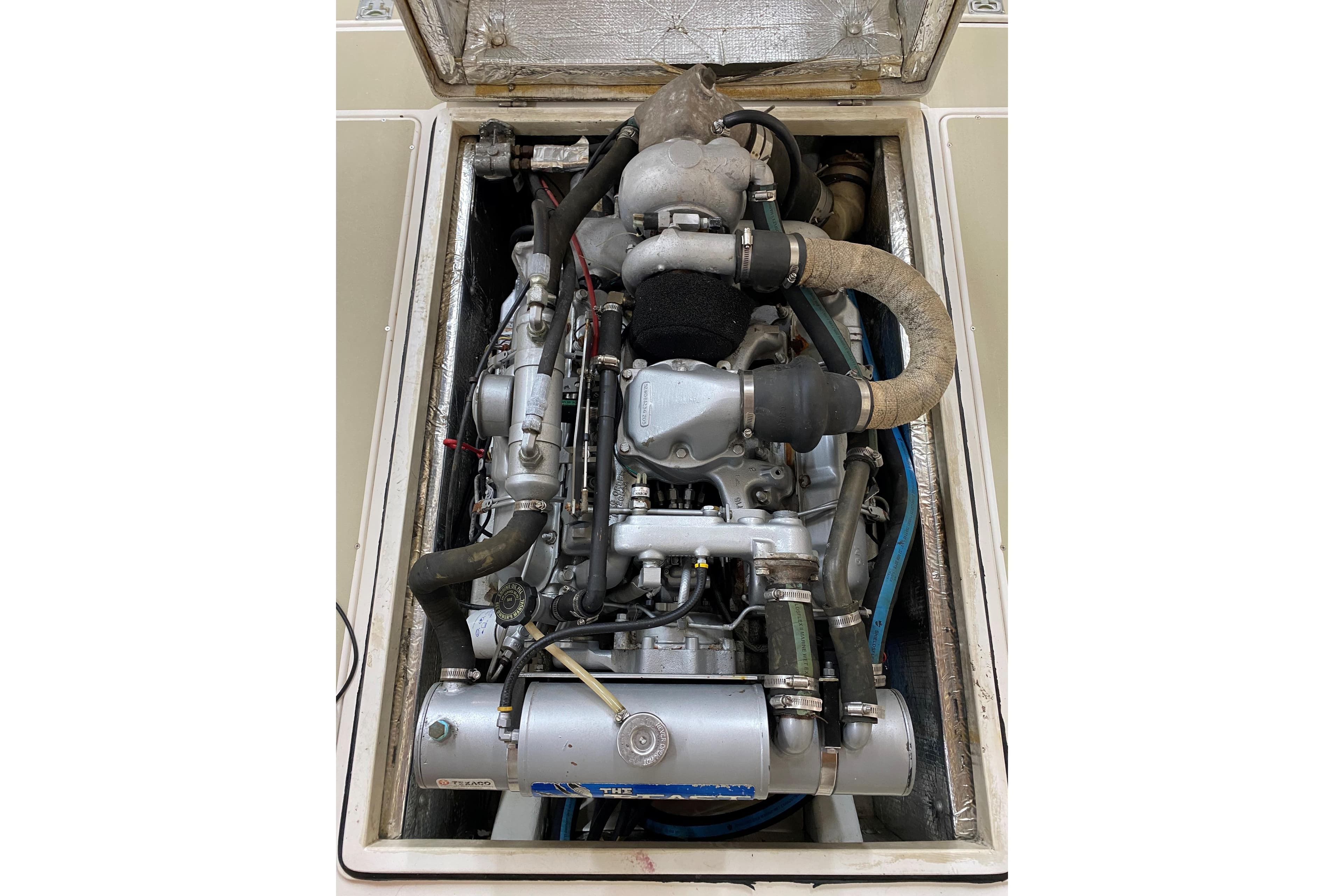 Engine of 1997 Wasque C.W.Hood Wasque 26 boat, detailed view.