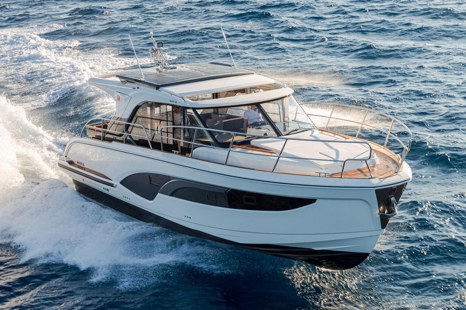 Manufacturer Provided Image: 2025 Marex 390 yacht cruising on open sea, showcasing sleek design and modern features.