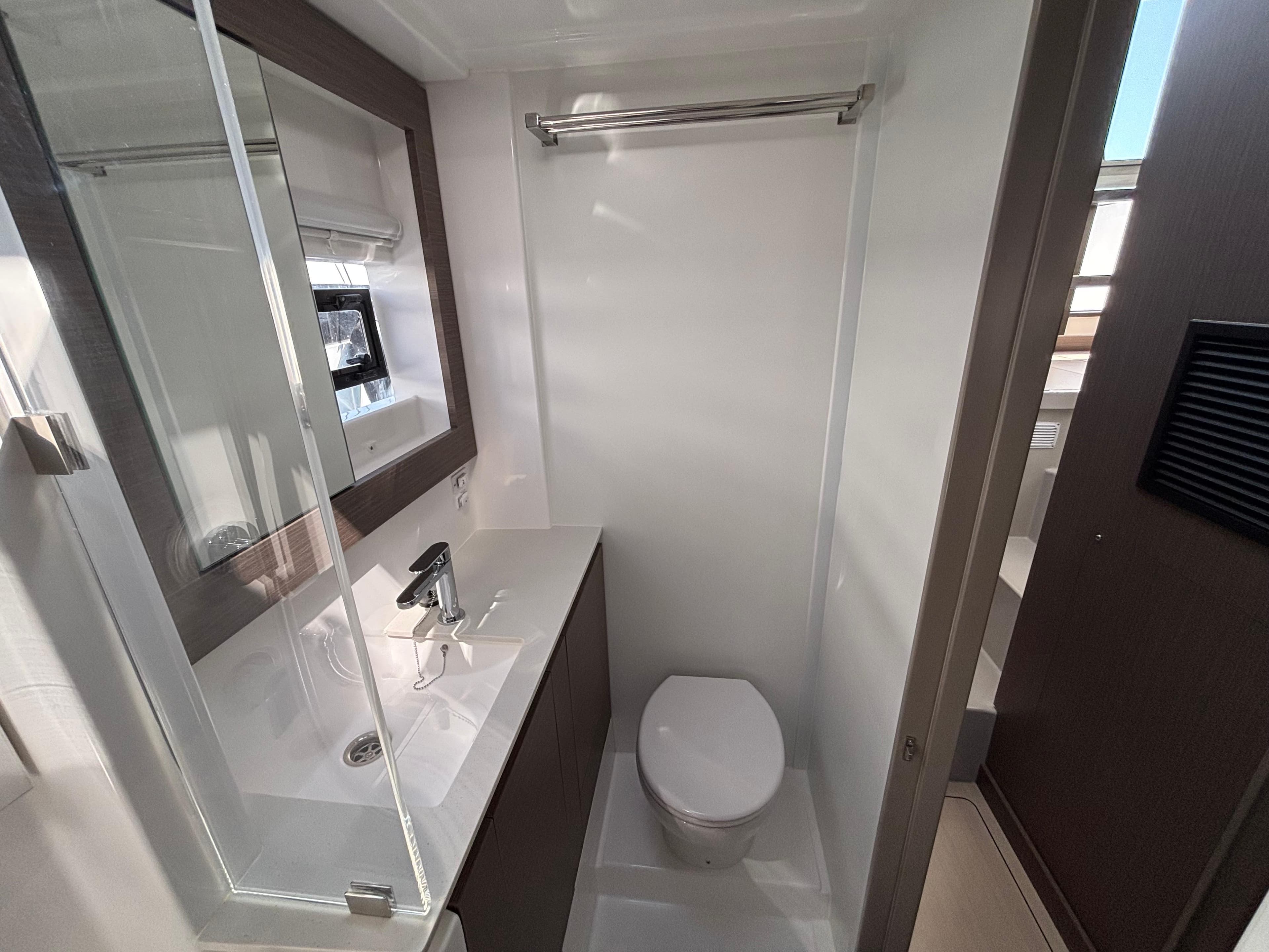 Modern bathroom in 2025 Leopard 42 yacht with sleek fixtures and compact design.