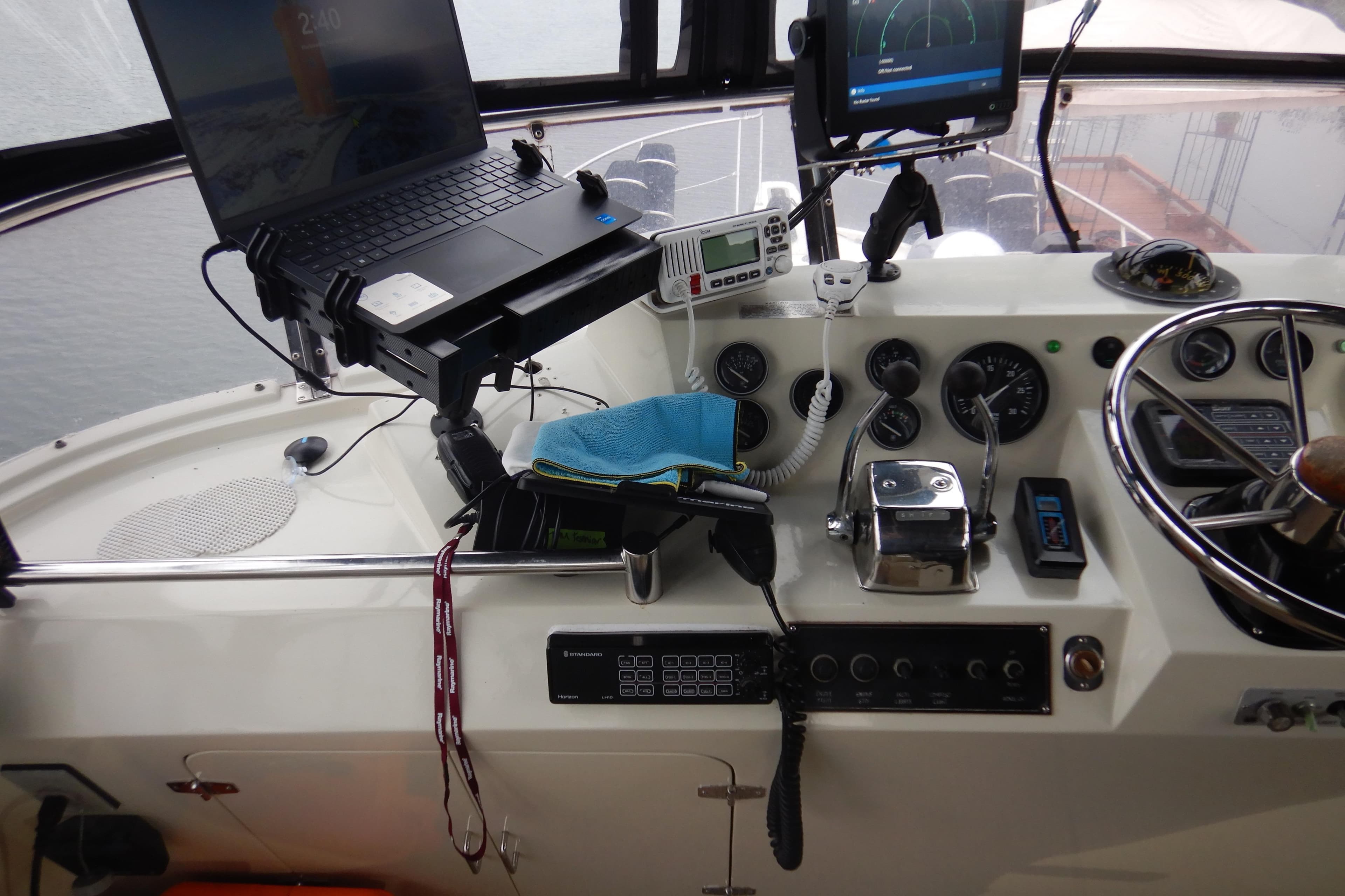 Cockpit of 1988 Camargue 48 Motor Yacht with navigation equipment and controls.