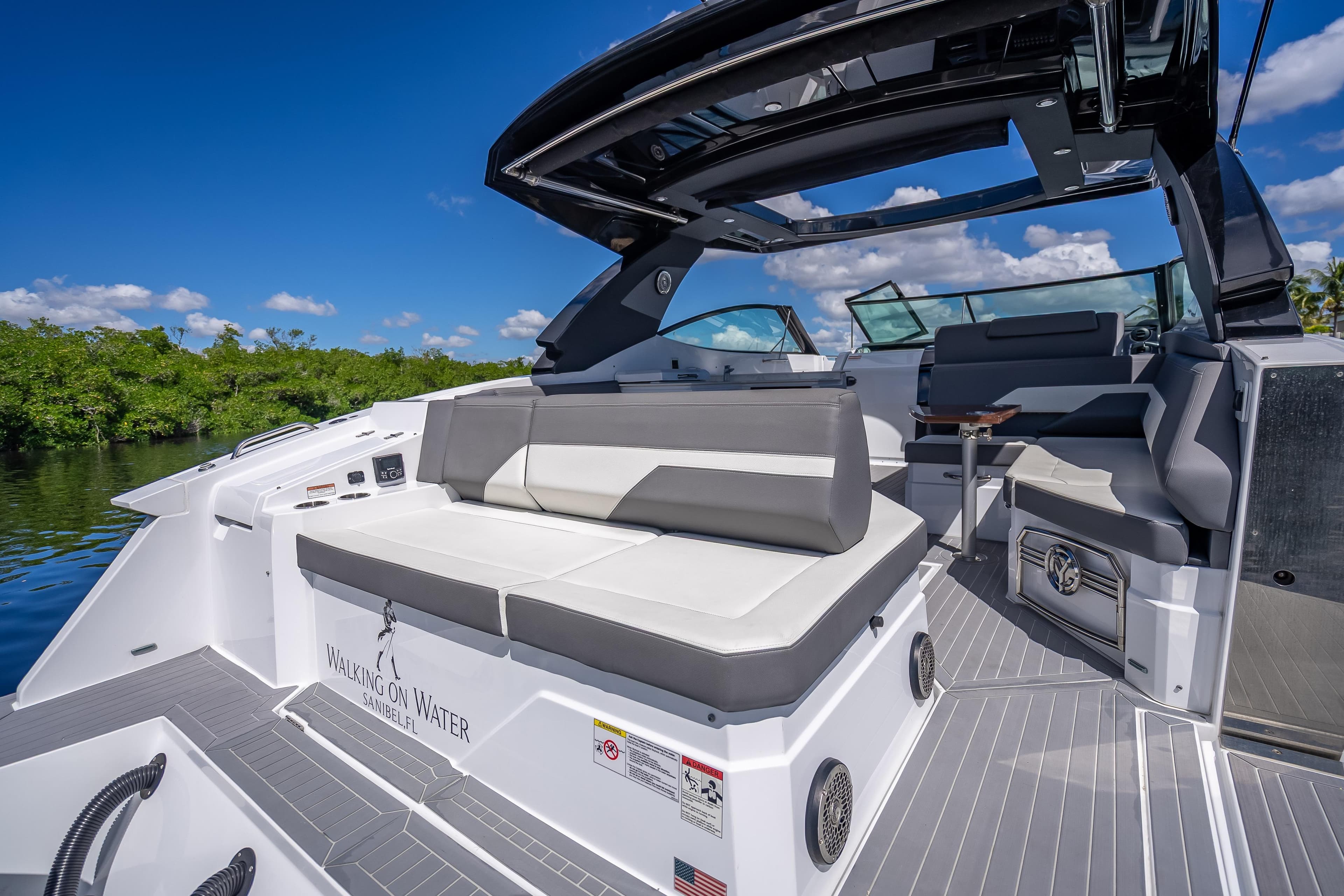 2022 Cruisers Yachts 38 GLS OB interior with sleek seating and modern design.