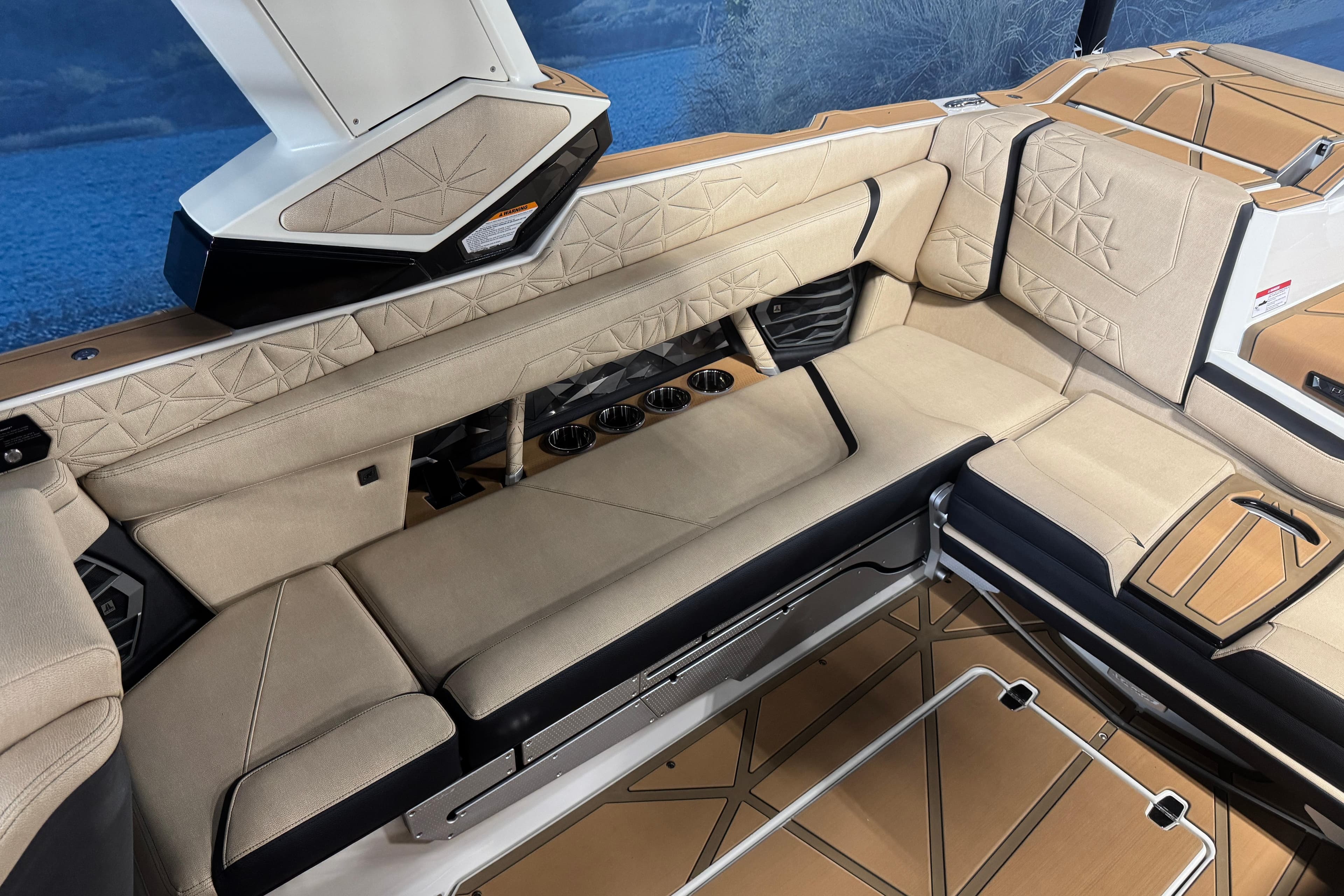 Luxurious interior of 2026 Nautique Super Air Nautique G25 Paragon boat with beige seating.