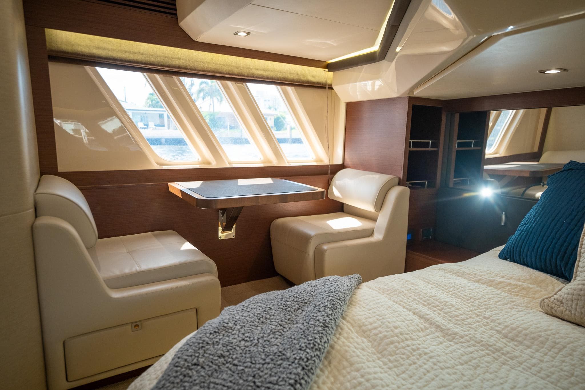 Luxurious interior of 2016 Sea Ray 510 Fly yacht with seating and table.
