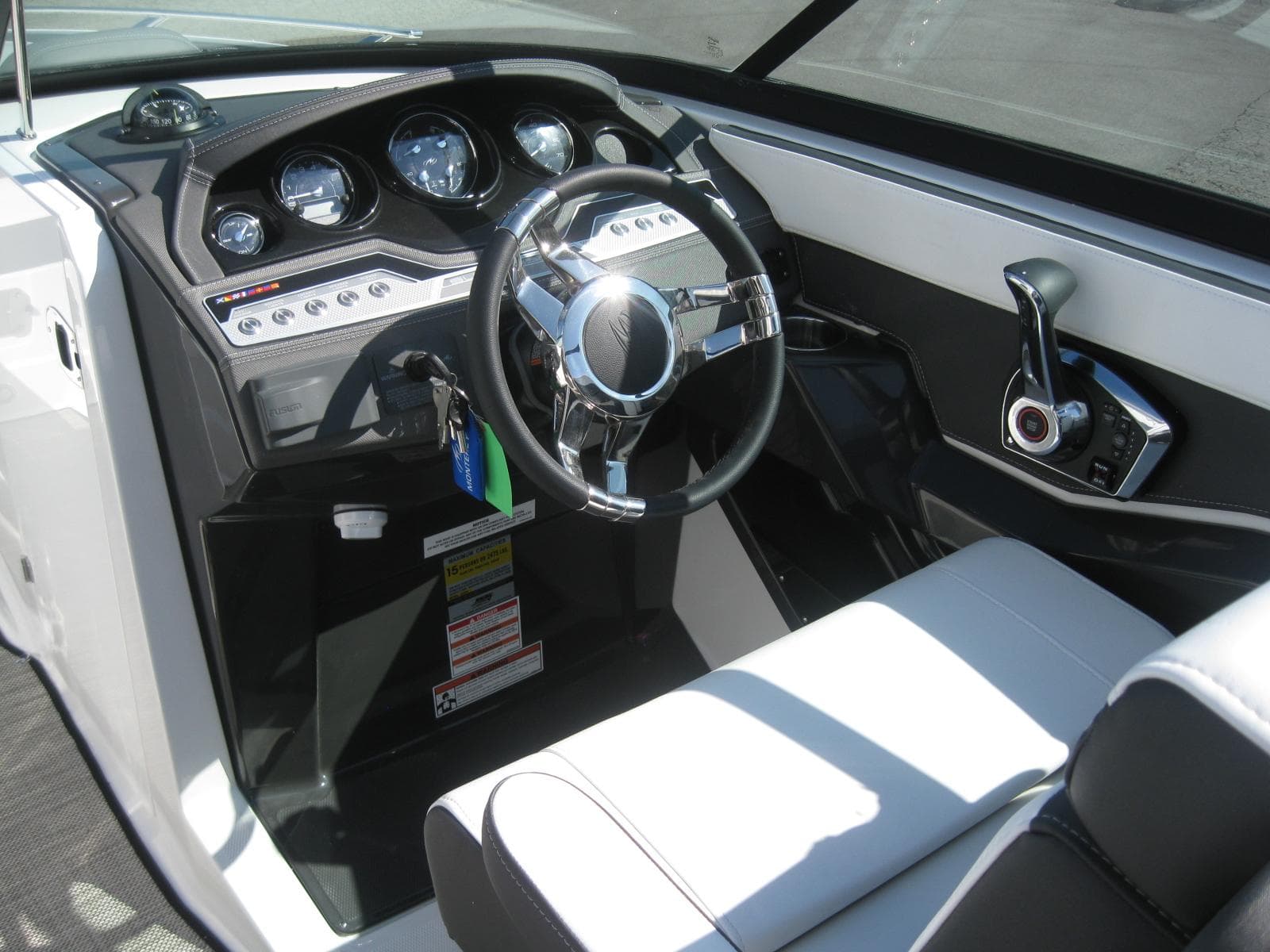 Interior of 2024 Monterey 258SS Super Sport boat with steering console.