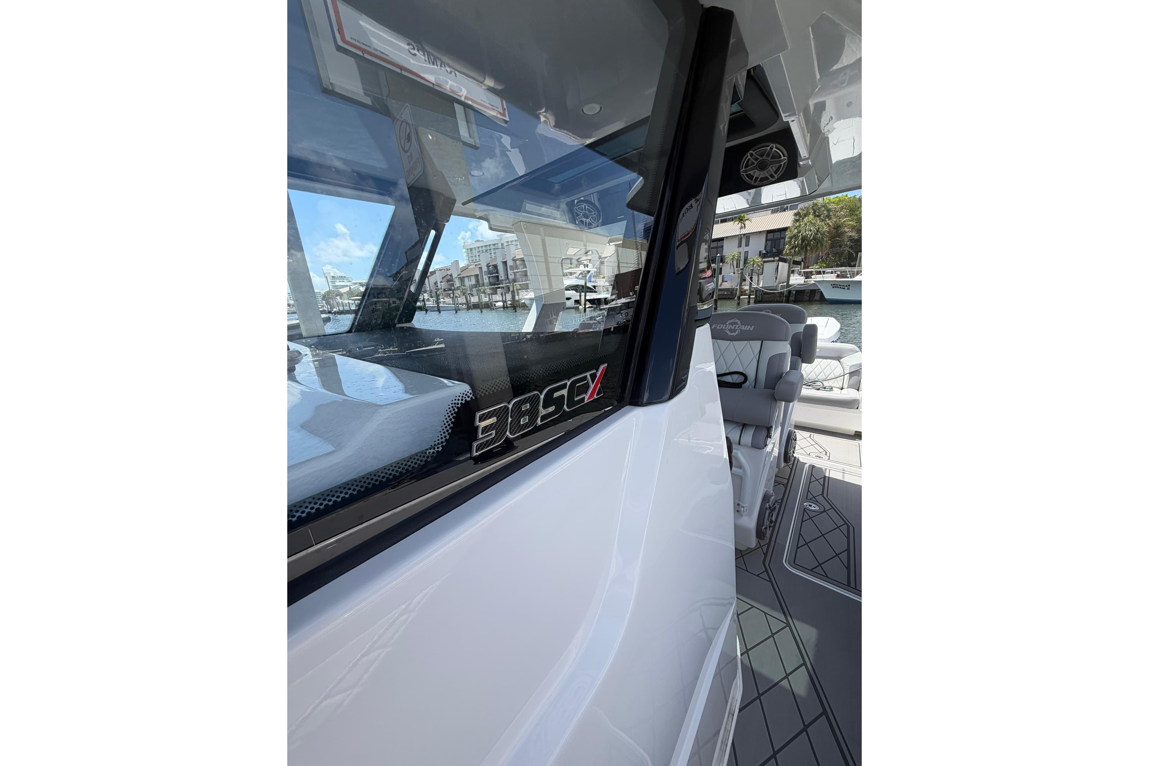 2024 Fountain 38 SCX boat interior with sleek design and waterfront view.
