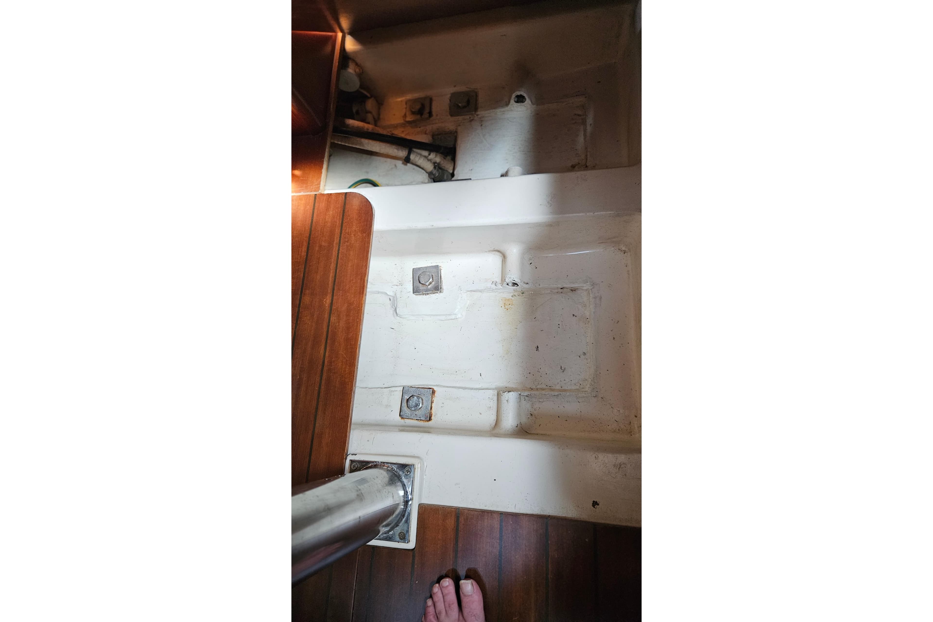 Interior view of a 2000 Beneteau Oceanis Clipper 361 sailboat, showing floor and fittings.