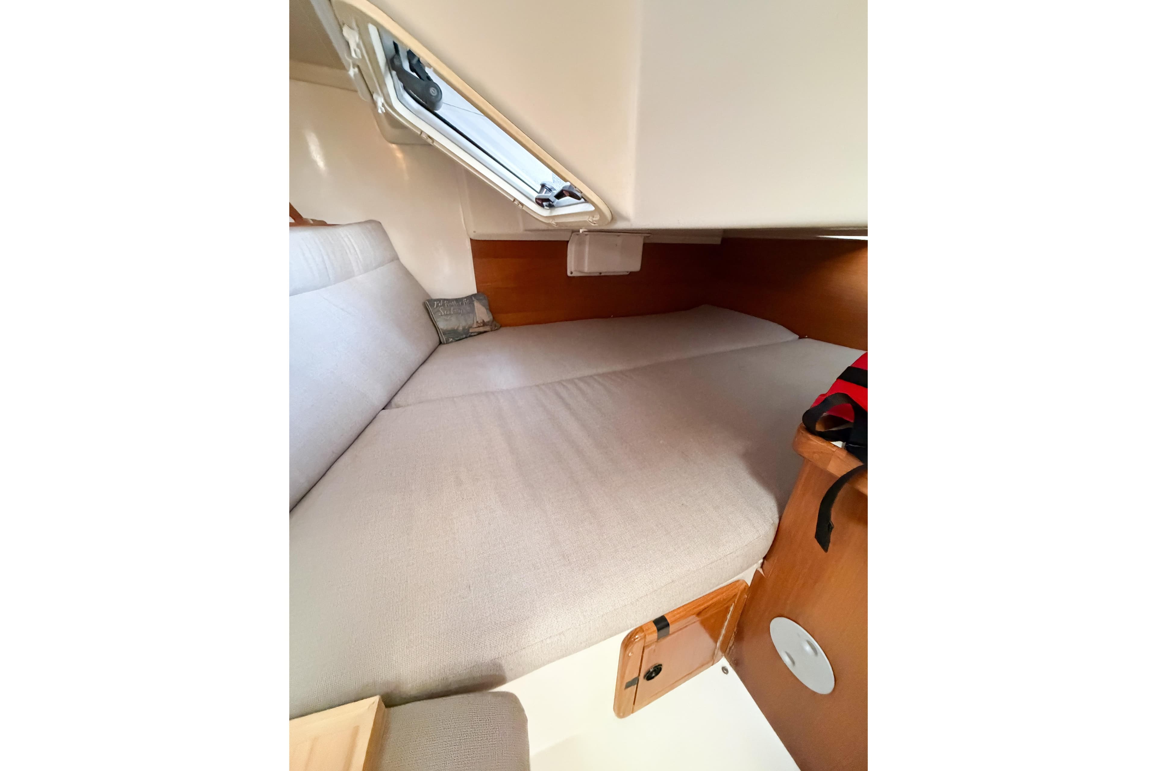 Cozy cabin interior of 2003 Catalina 34 MkII sailboat with comfortable bedding.