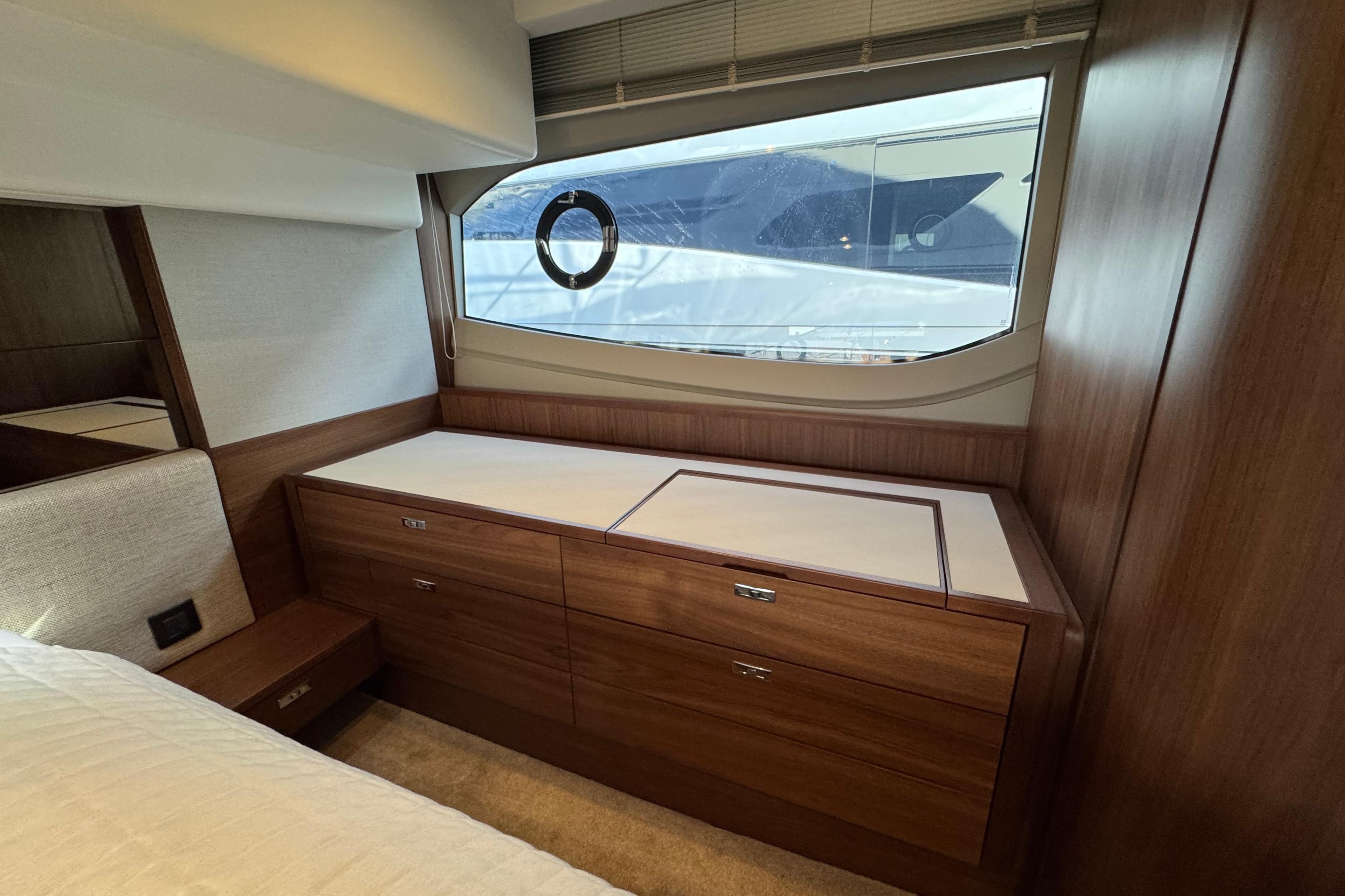 Luxurious interior of 2020 Princess F50 yacht with elegant wood cabinetry.