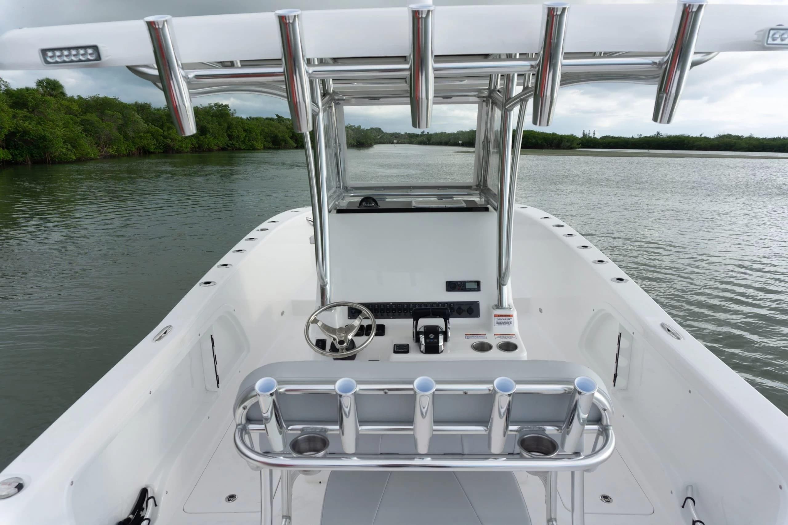 Interior view of 2026 Twin Vee 280 STX CC boat on calm waters.