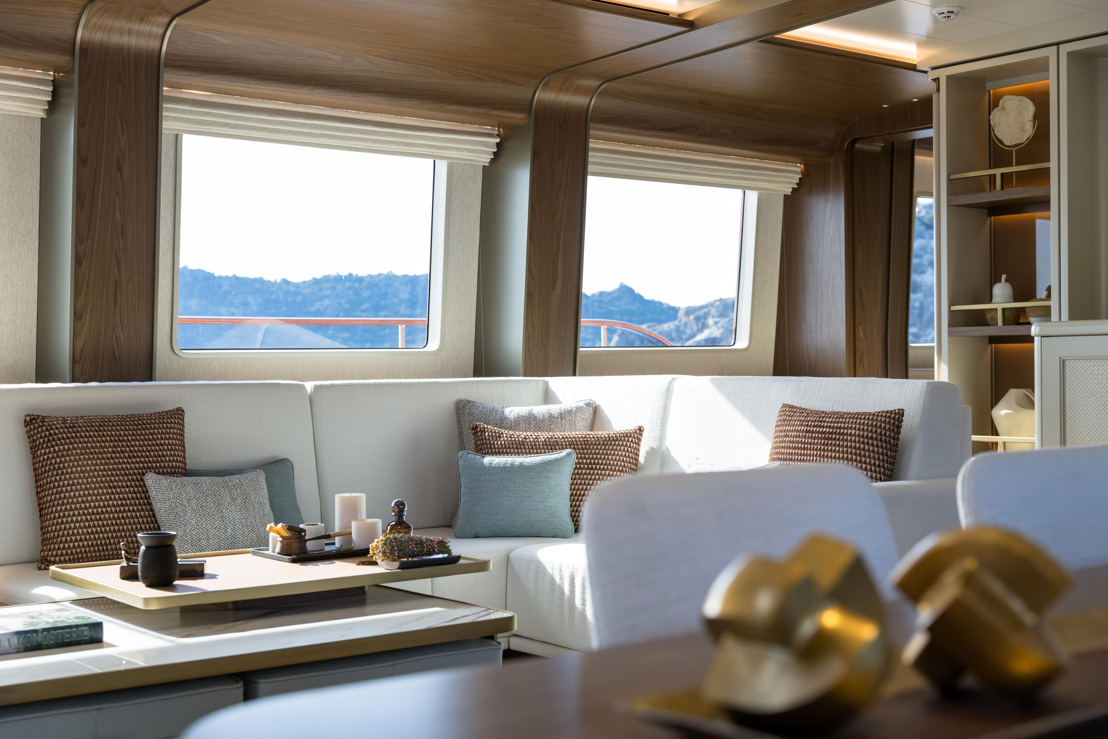 Luxurious interior of 2026 Custom Ares 62 yacht with elegant decor and scenic views.