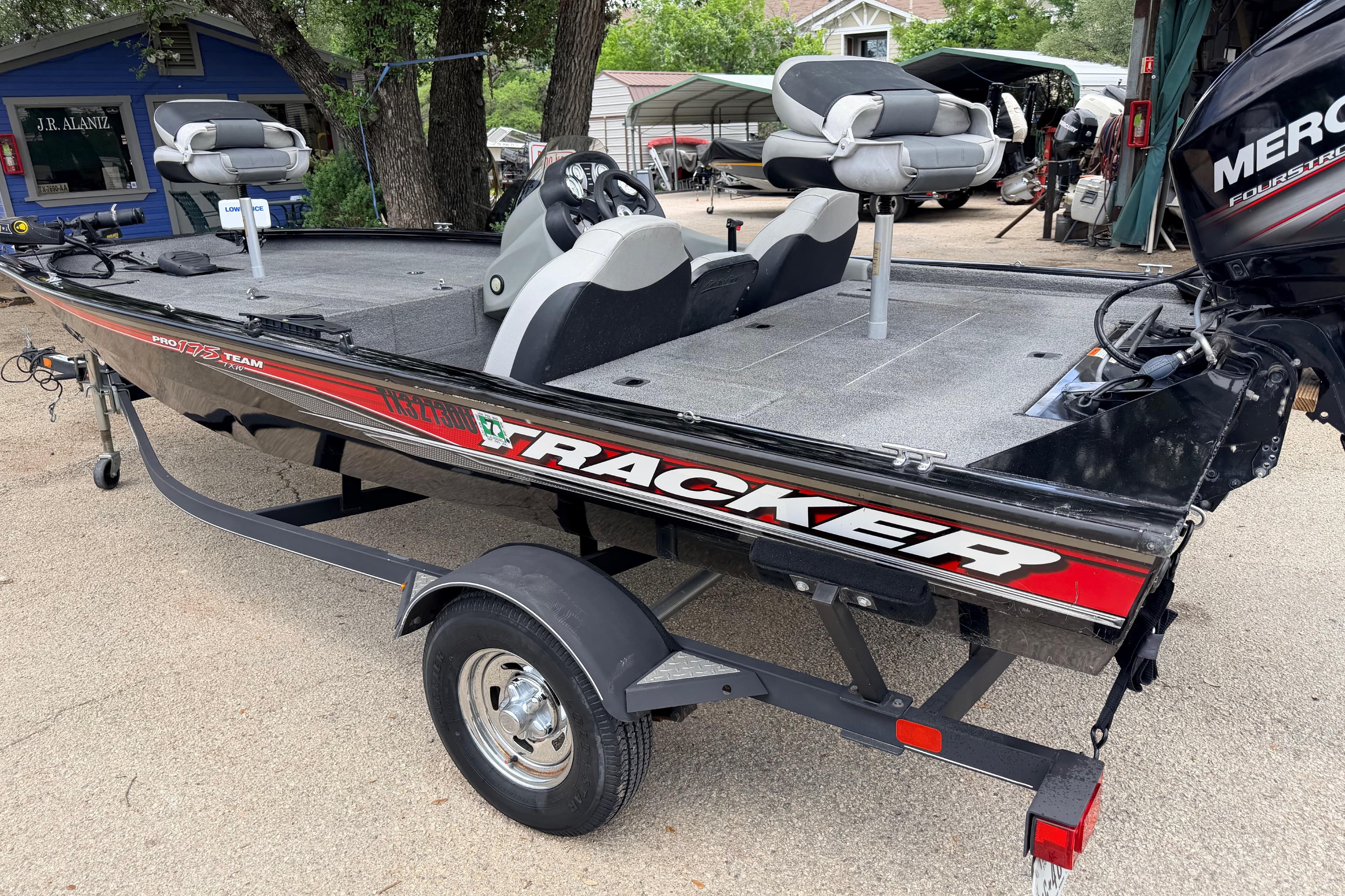 2017 Tracker Pro Team 175 TXW fishing boat on trailer, featuring Mercury engine.