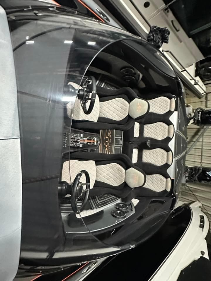 2018 MTI 340X boat interior with sleek design and modern seating arrangement.
