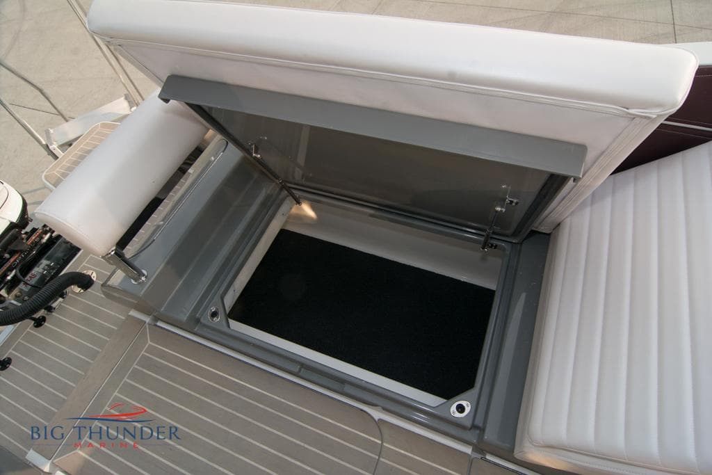 2019 Donzi 41 GT storage compartment with open hatch.