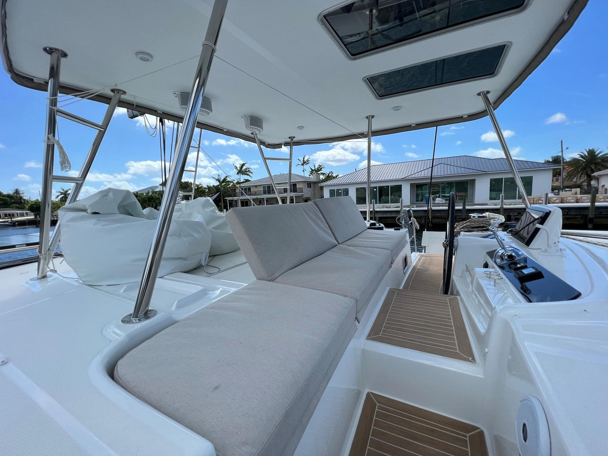 2022 Lagoon 46 catamaran with spacious deck and seating area.