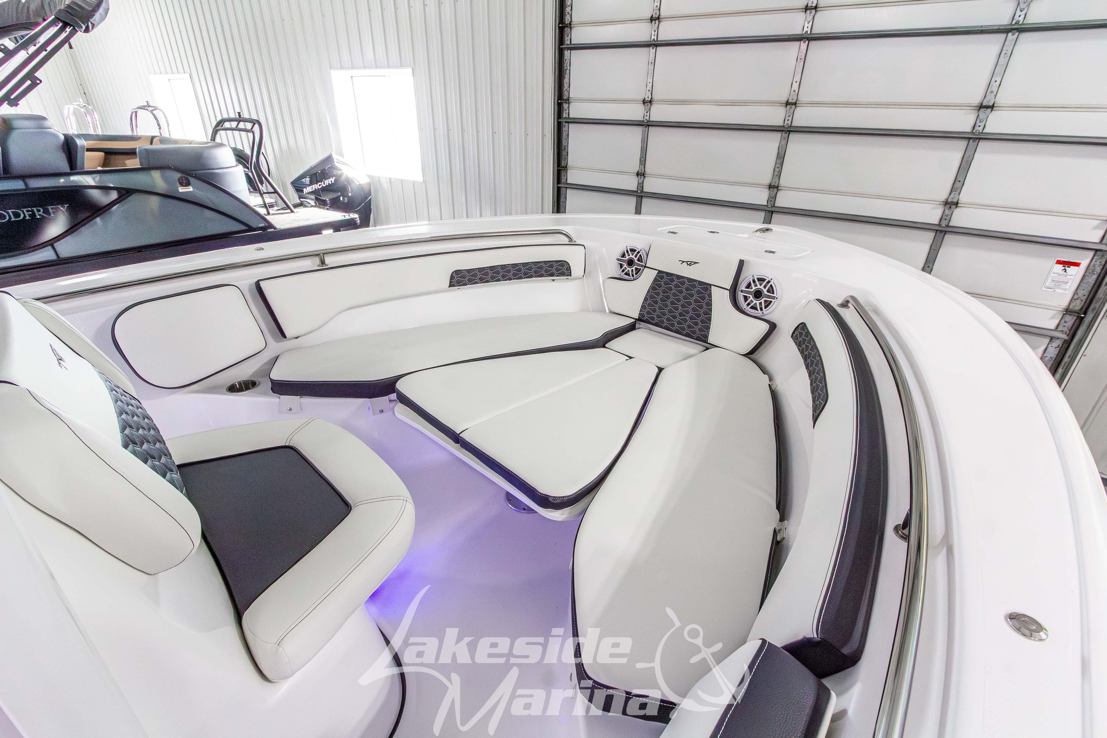 2026 Tidewater 220 LXF boat interior with luxurious seating and modern design.