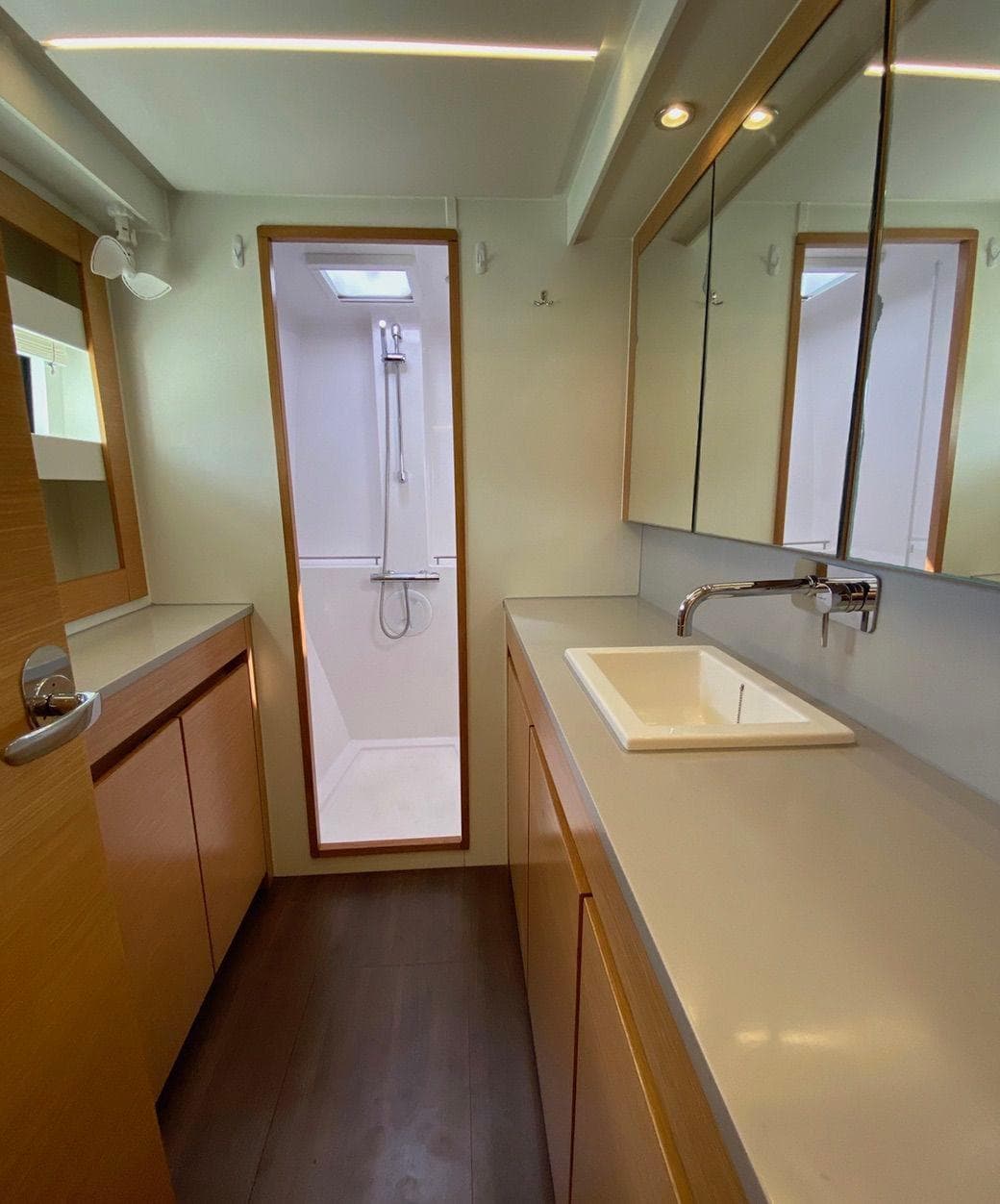 Modern bathroom in 2018 Nautitech 46 Open yacht with sleek fixtures and ample storage.