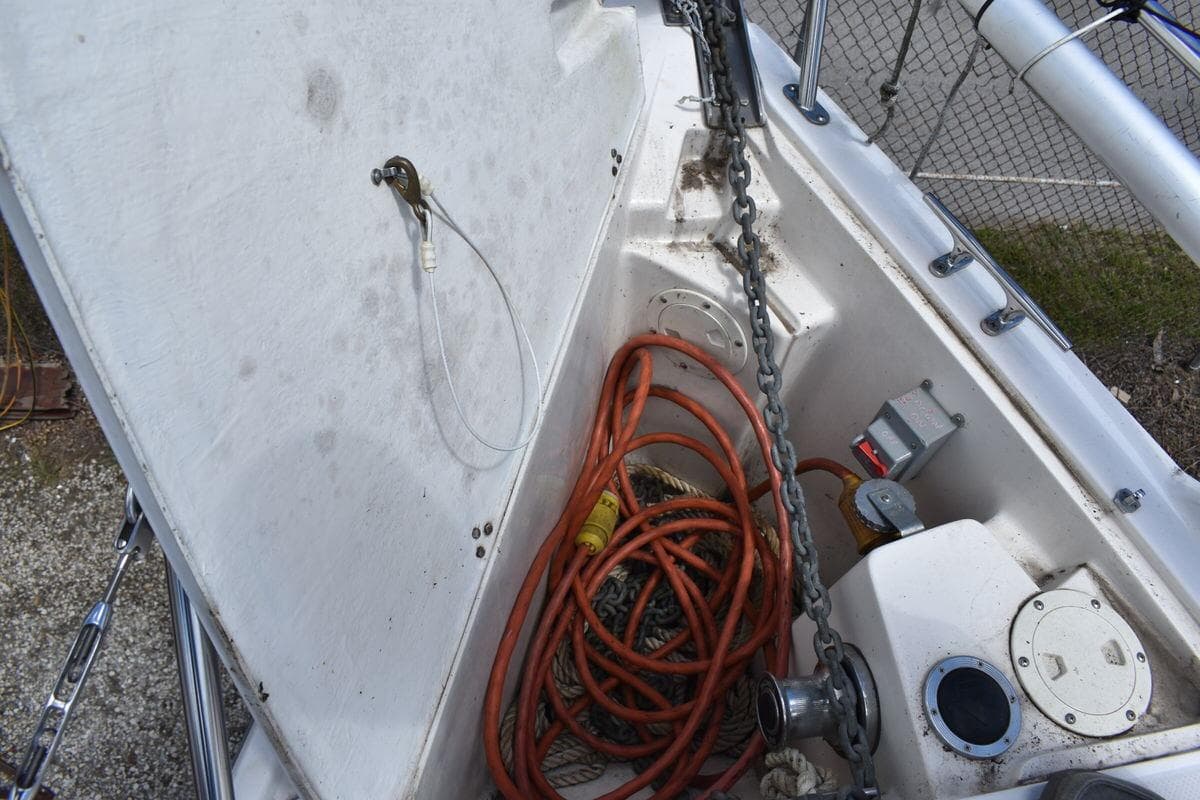 Anchor locker of a 2001 Catalina 310 sailboat with chain and cables.