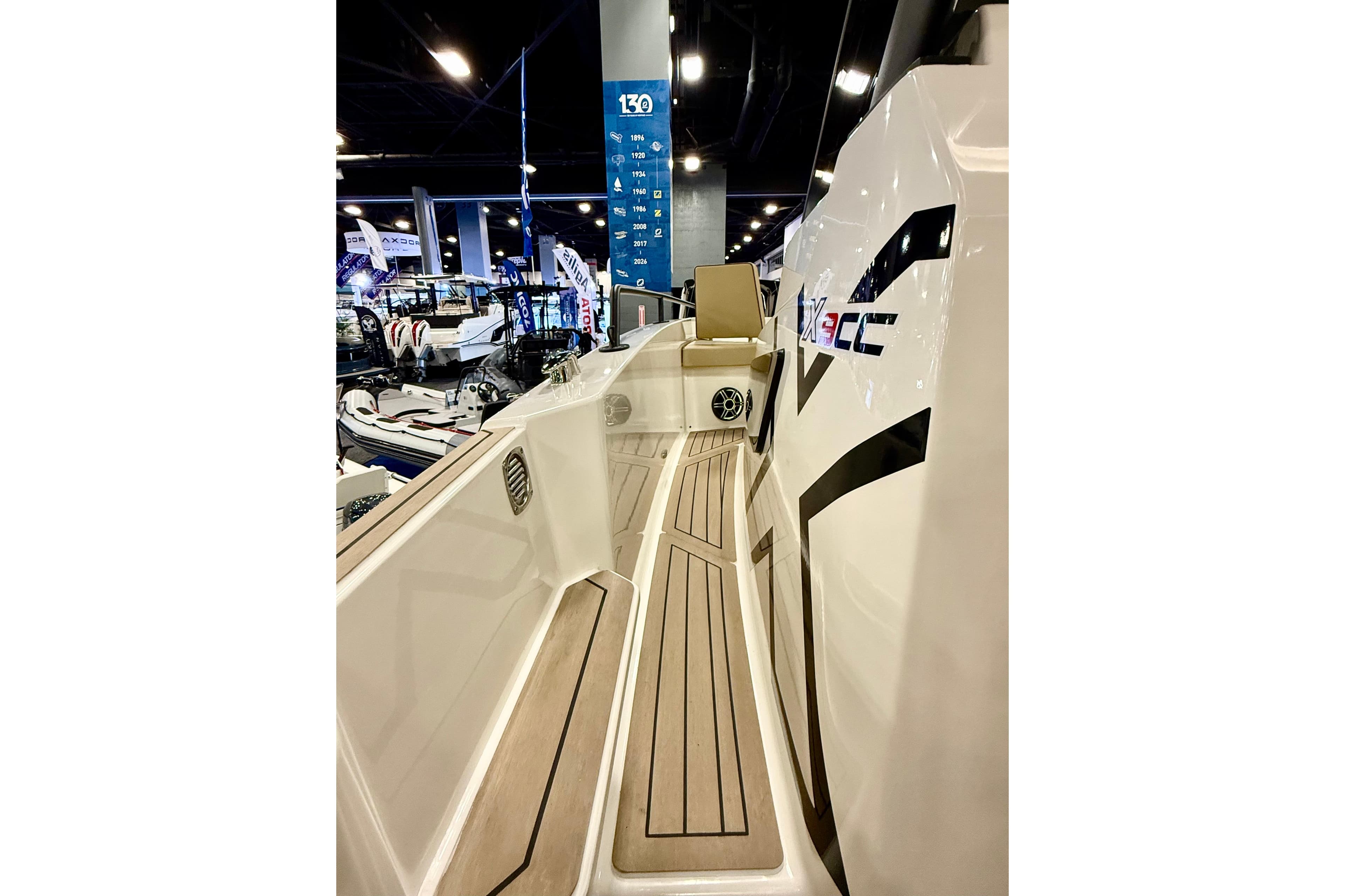 2026 Zodiac X9CC boat interior at a boat show, featuring sleek design and modern amenities.