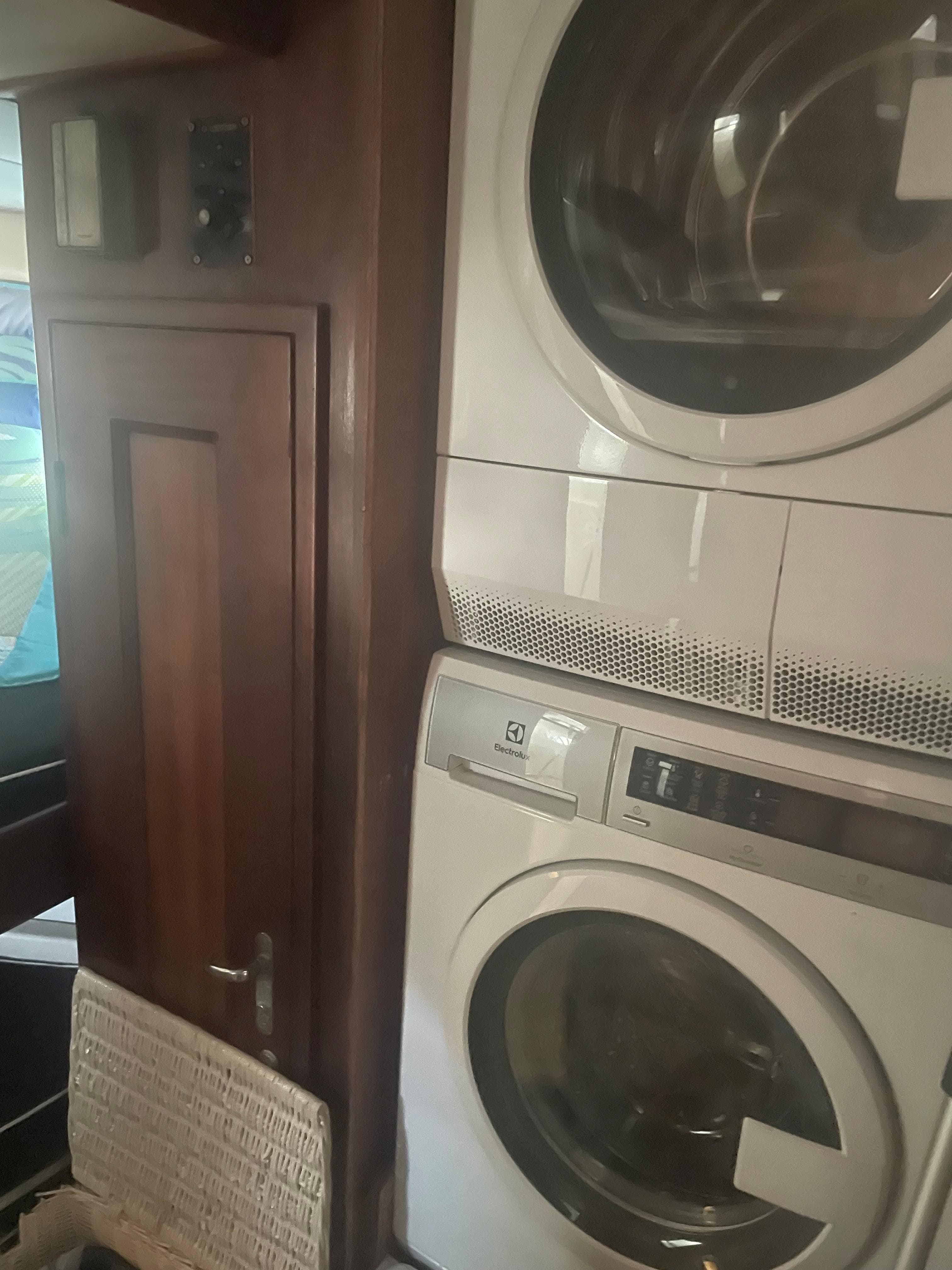 Interior of Hatteras 58 yacht with washer and dryer.