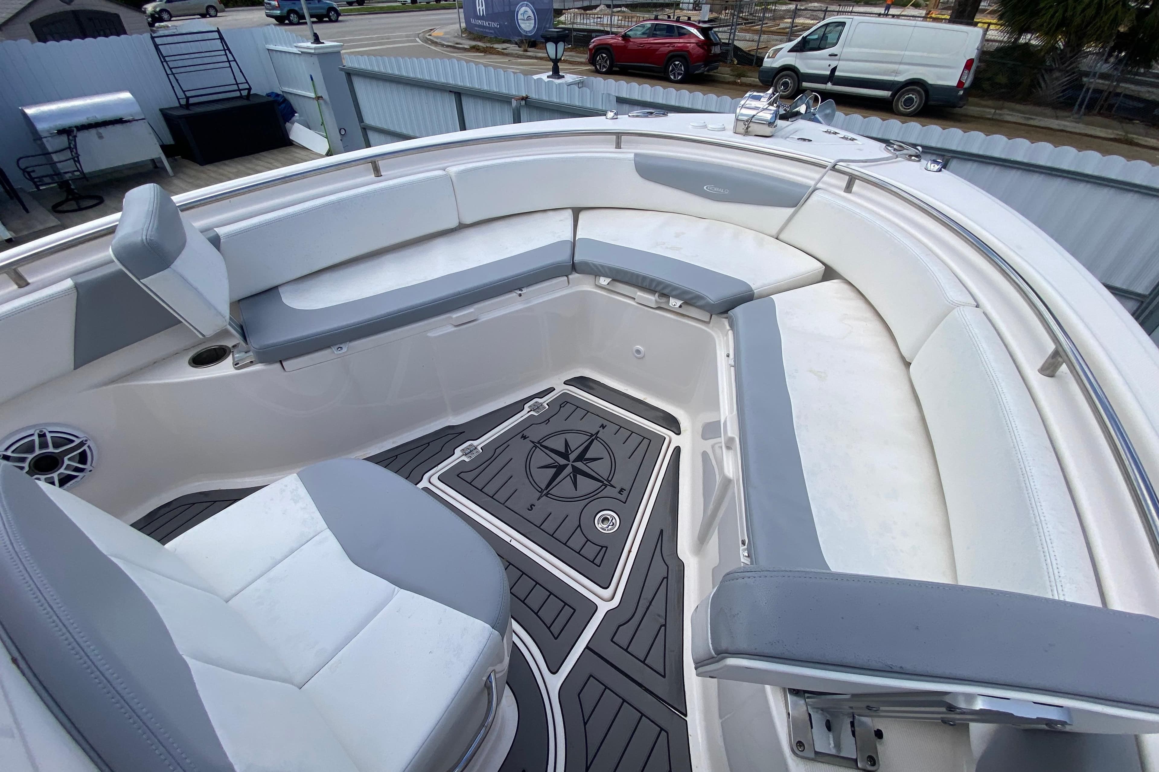 2022 Robalo R242 Center Console boat with spacious seating and stylish deck design.