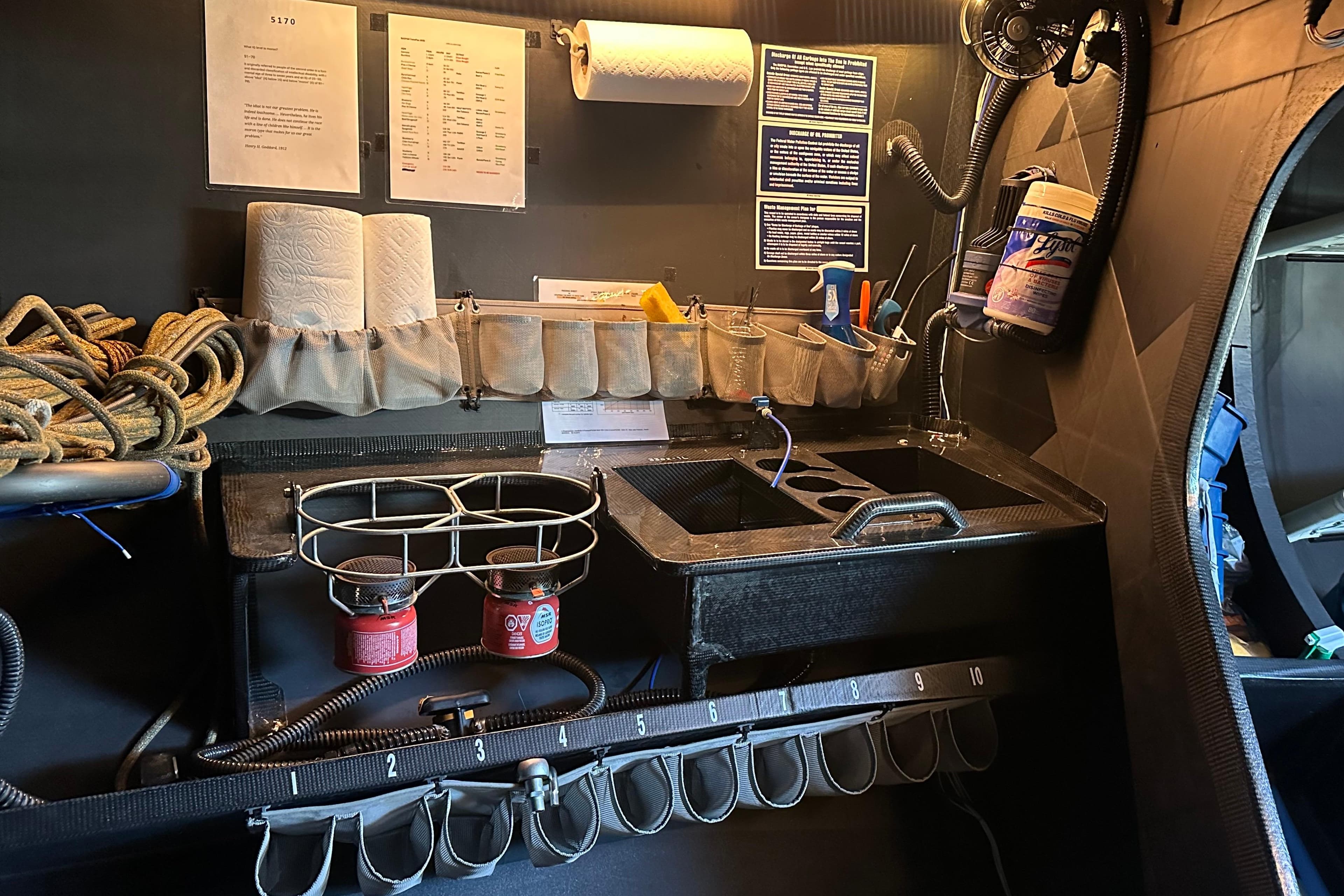 Interior of a 2018 Botin 56 yacht with organized storage and equipment.