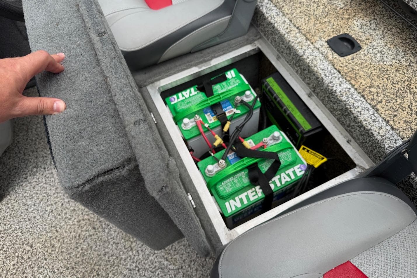 2016 Tracker Pro Team 175 TXW boat battery compartment with Interstate batteries visible.