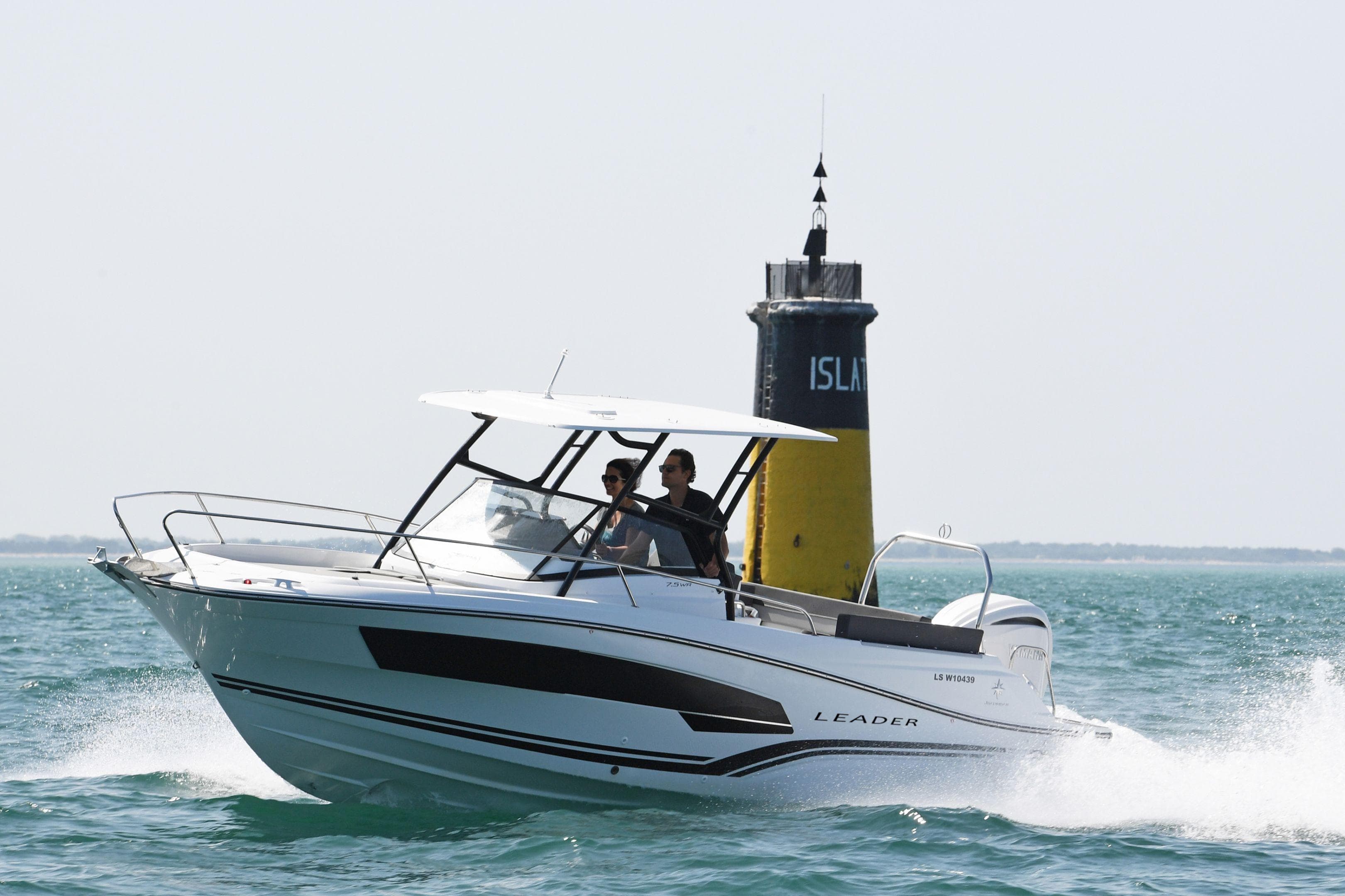 2026 Jeanneau Leader 7.5 WA Series 3 cruising near a buoy in open water.