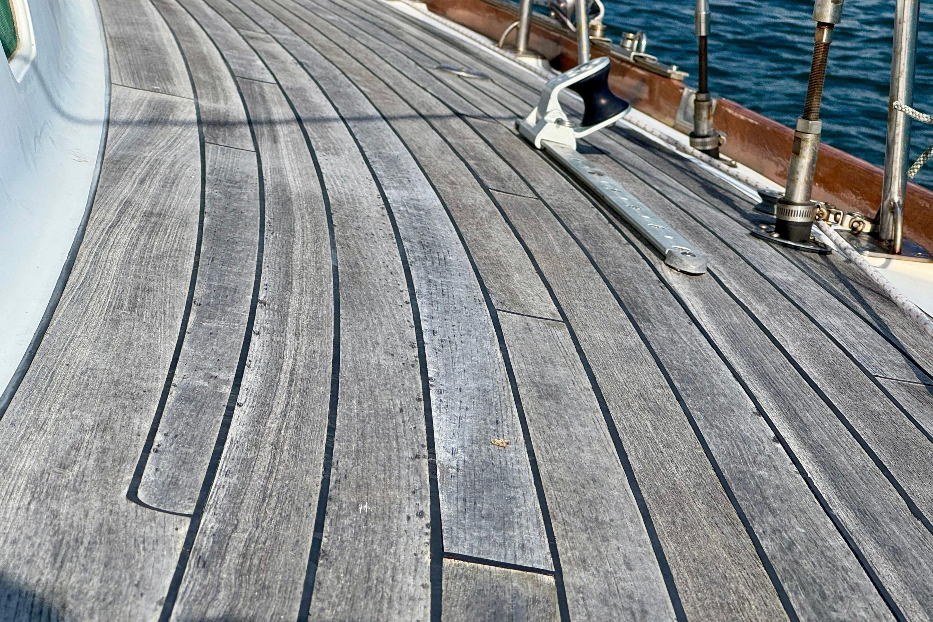 Teak deck of 1982 Hinckley Bermuda 40 MK III sailboat with metal fittings.