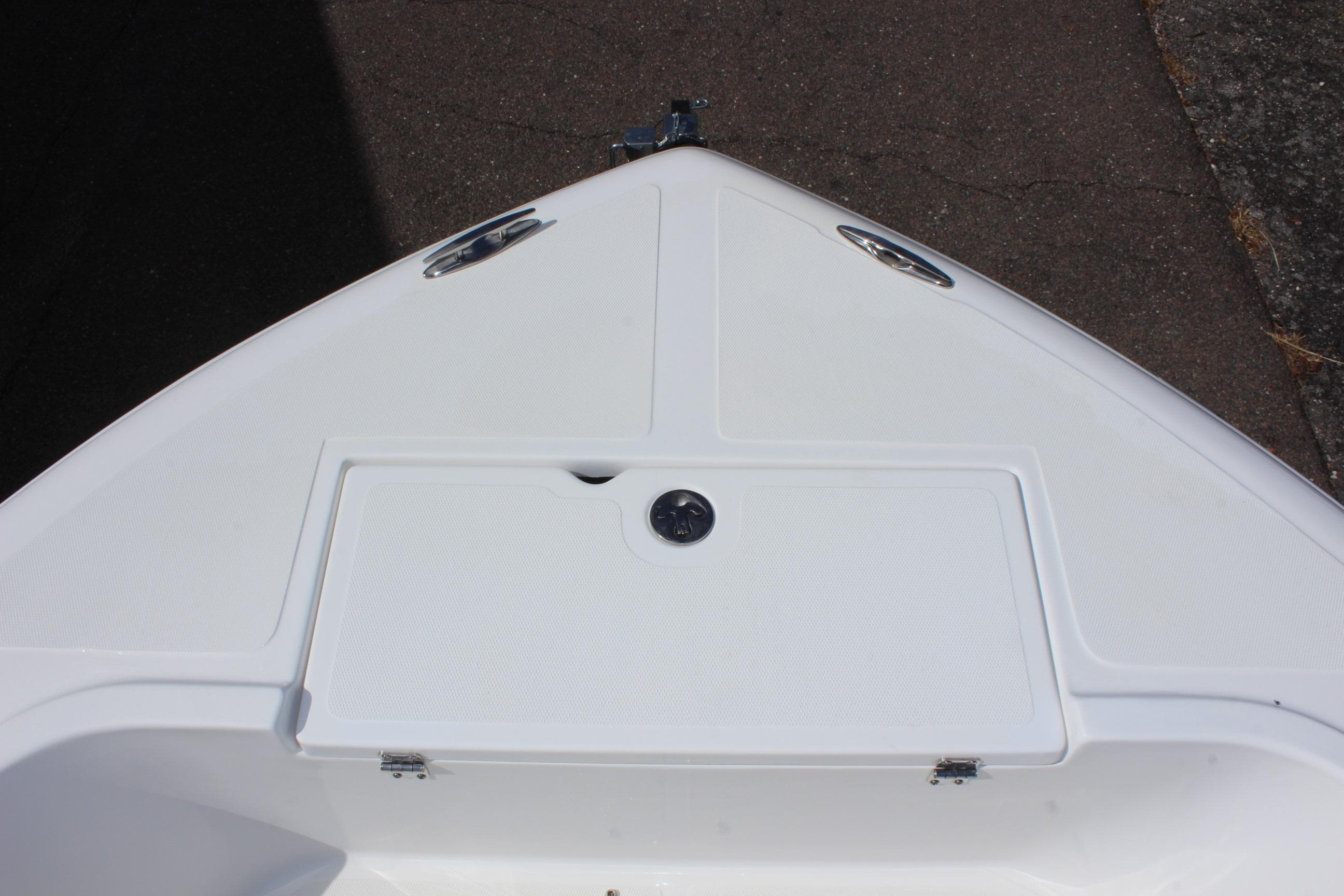 Bow of 2024 Clear Water 2000 CC boat with storage compartment.