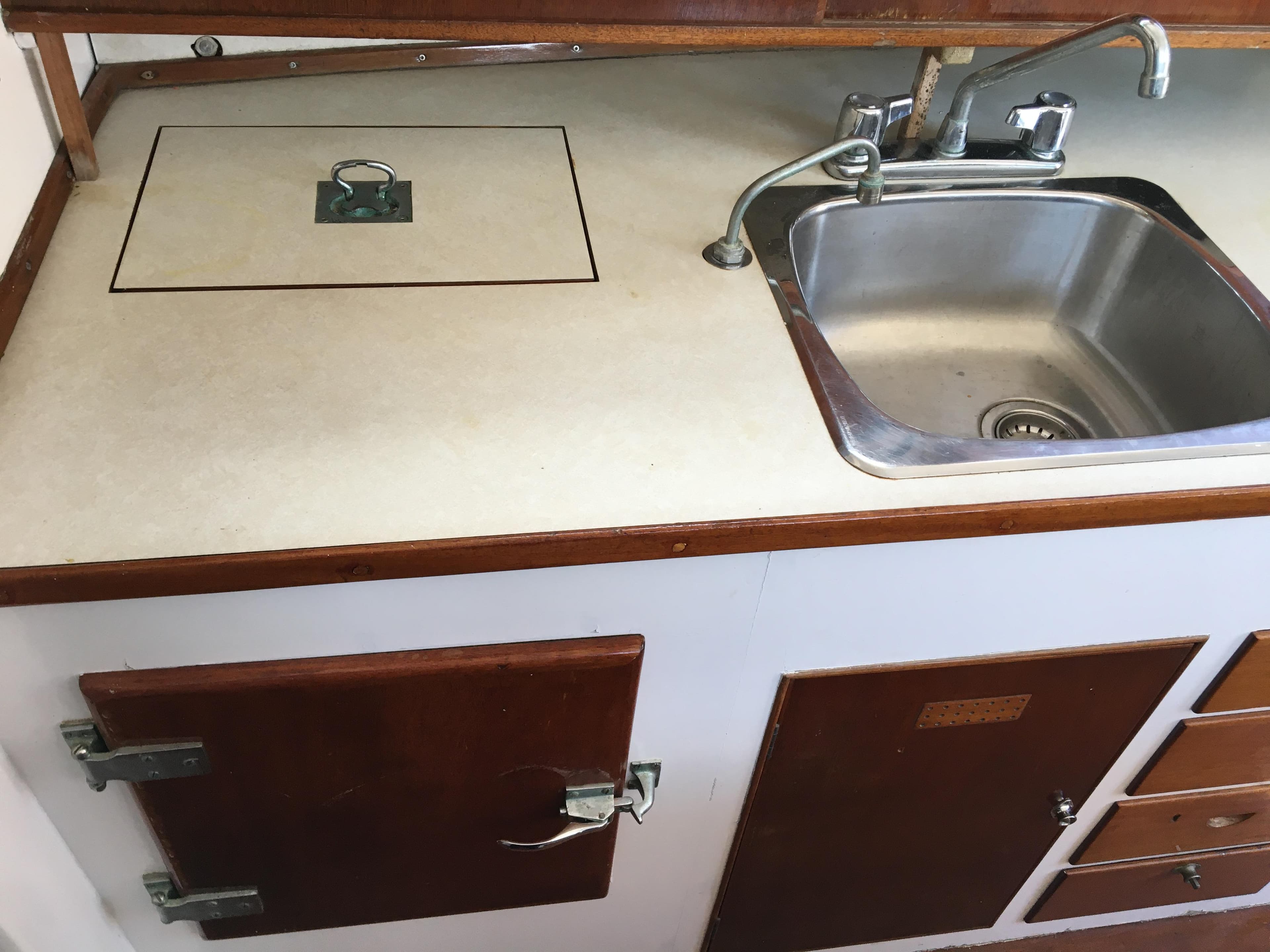 Galley w/electric fridge & stainless sink