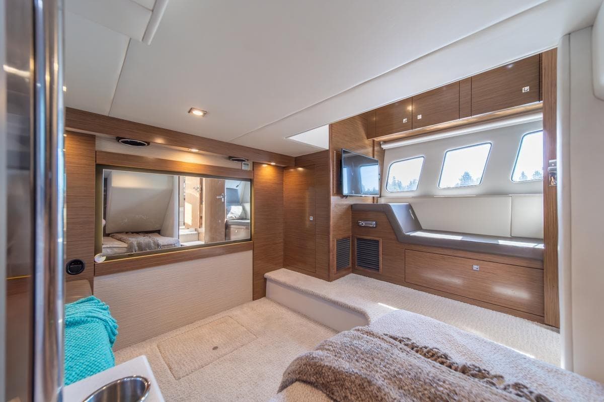 Luxurious interior of 2017 Cruisers Yachts 45 Cantius with modern design and ample natural light.
