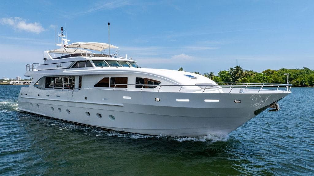 2001 Intermarine Raised Pilothouse yacht cruising on water.