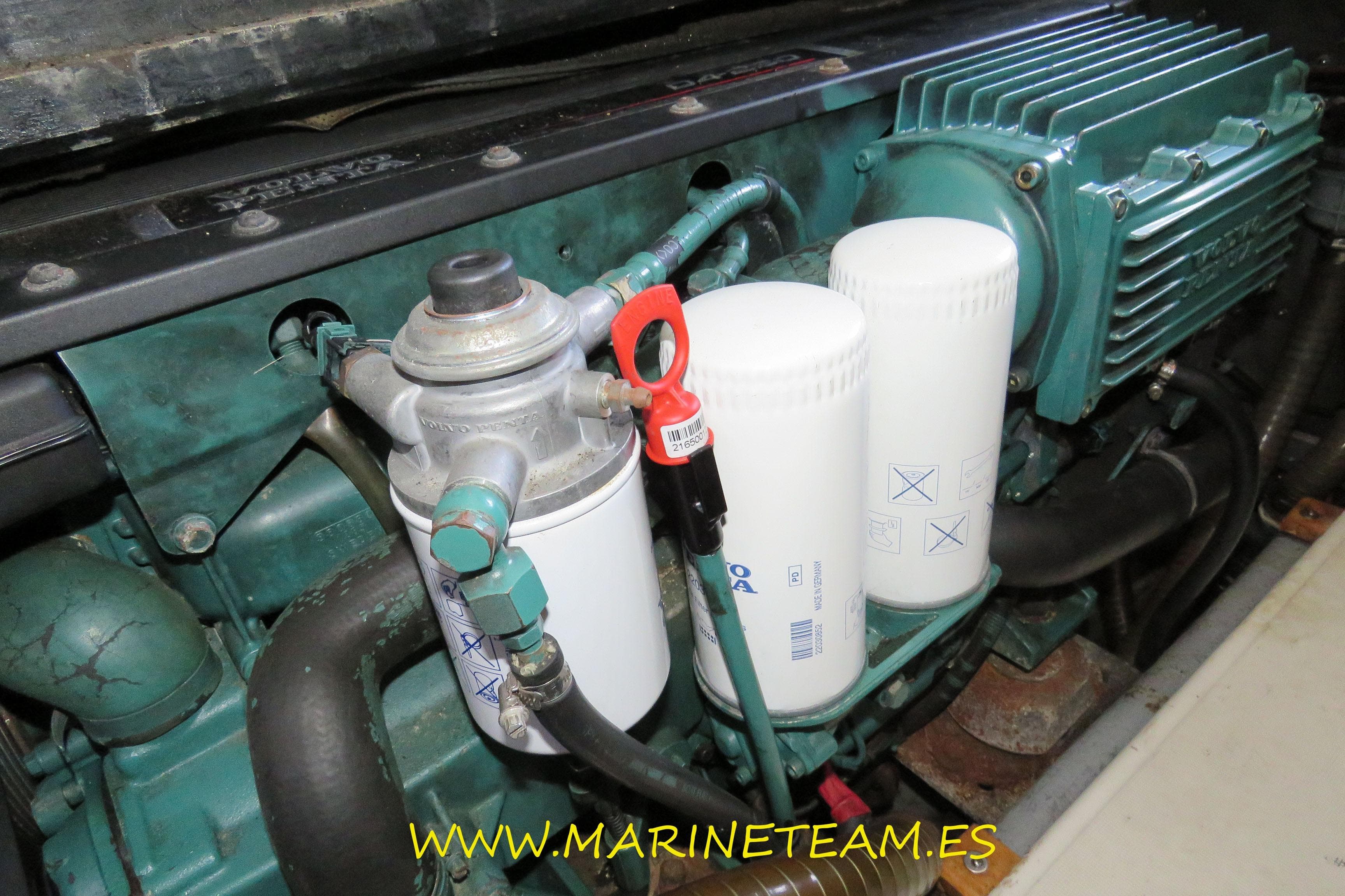 Engine compartment of a 2005 Starfisher 1060 boat, featuring filters and components.