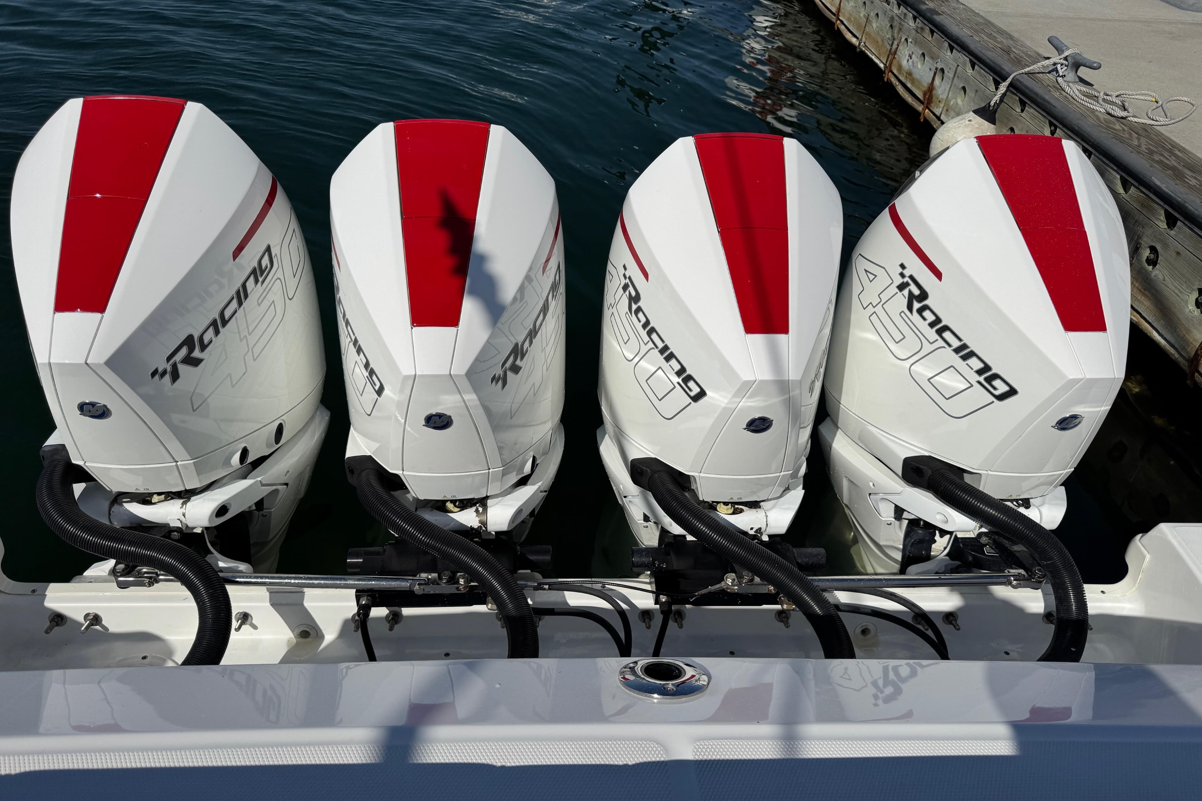 Four powerful outboard engines on a 2021 Boston Whaler 420 Outrage boat.