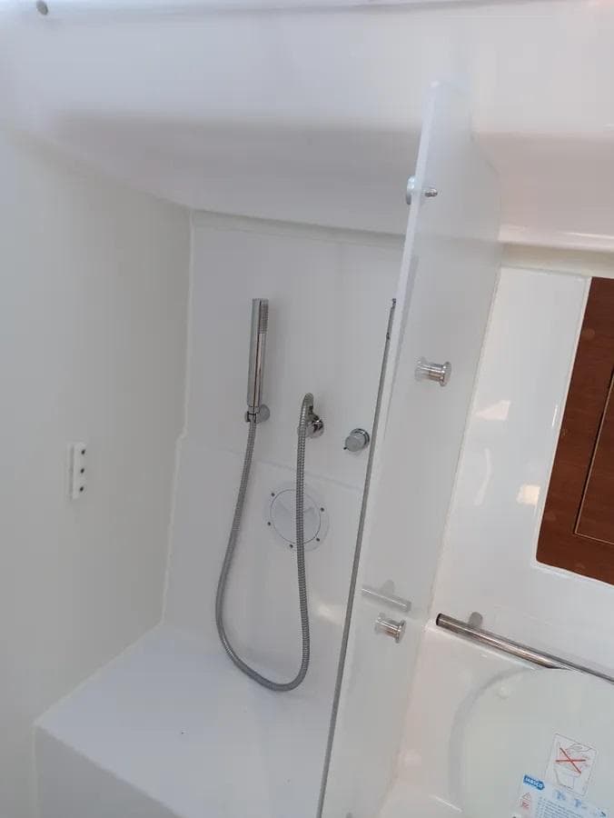 Interior shower area of 2020 Elan Impression 45.1 yacht, featuring modern fixtures.