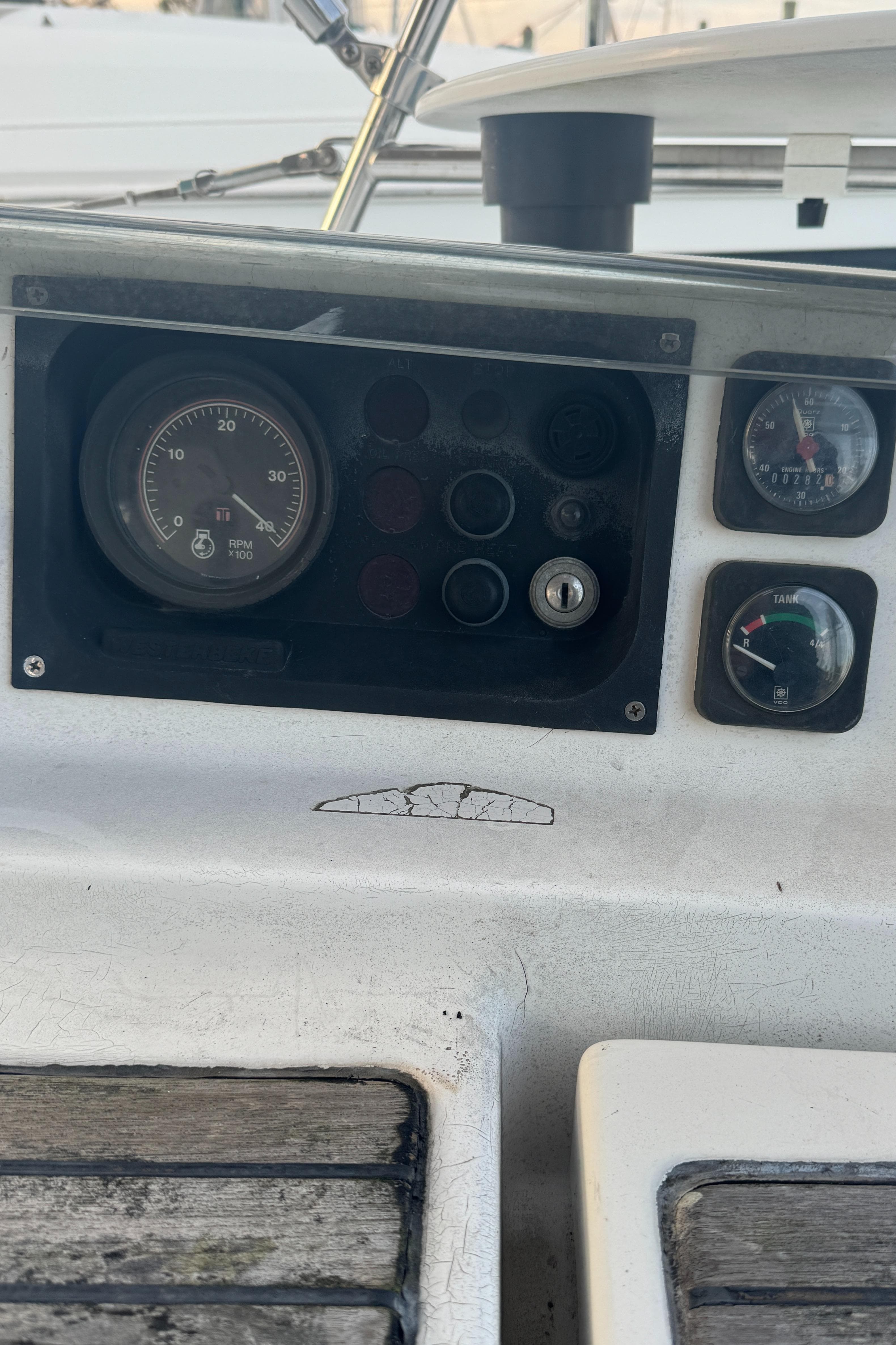 Control panel of a 2001 Beneteau 361 sailboat with gauges and switches.